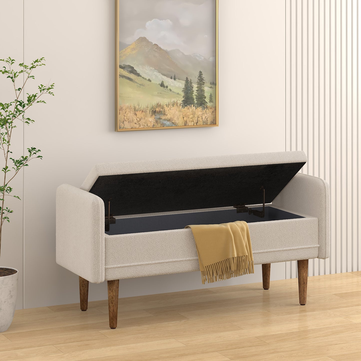 Cream boucle storage bench with open lid and yellow throw