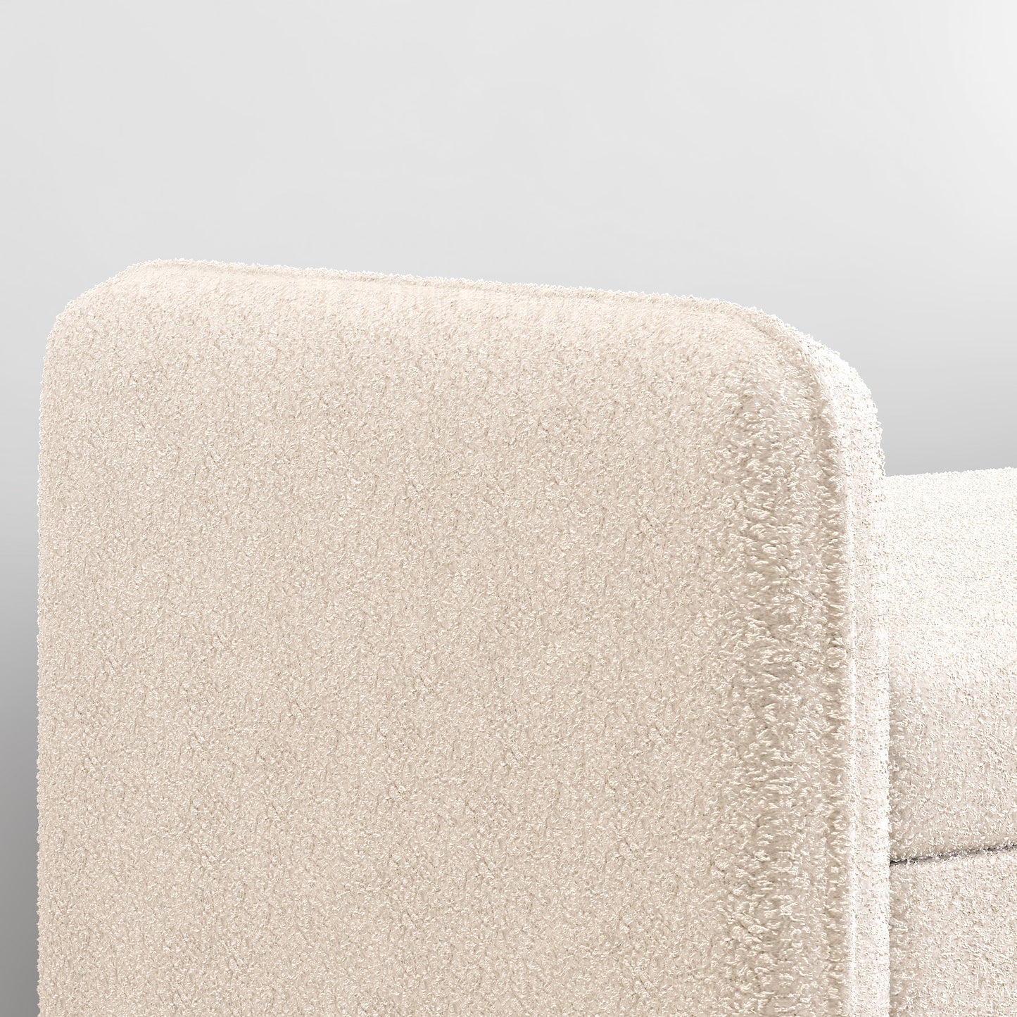 Cream boucle armchair armrest detail