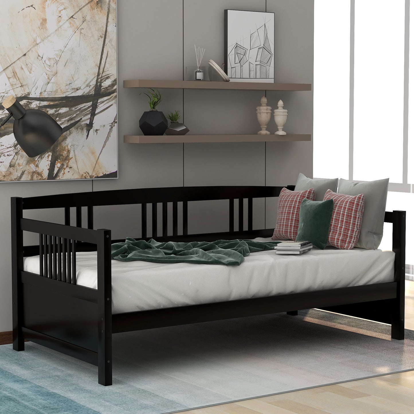 Black wooden daybed with spindle back and white mattress