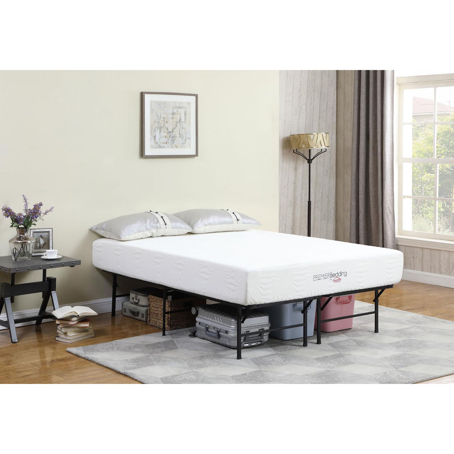 White memory foam mattress with embossed swirl pattern on a metal bed frame
