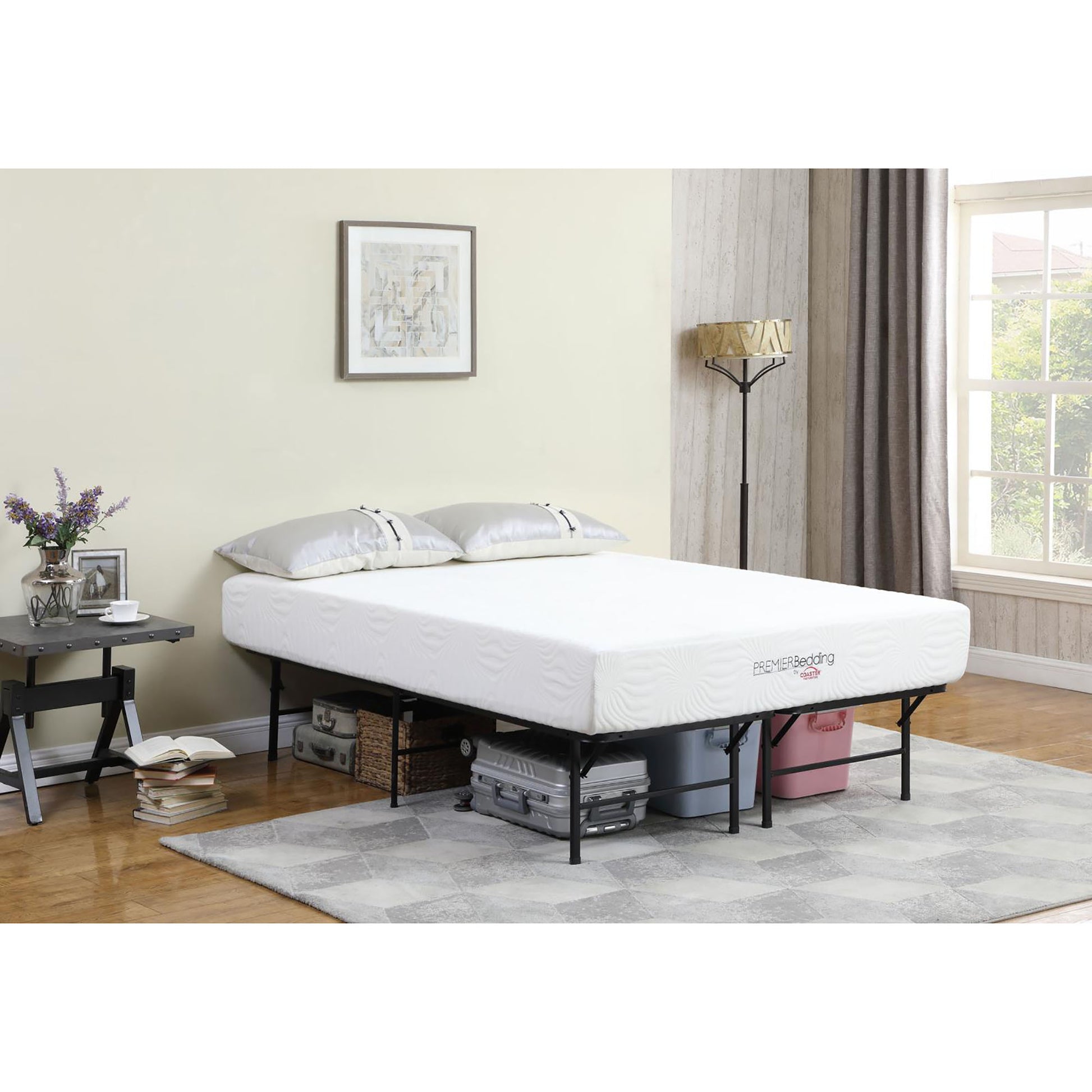 White memory foam mattress with embossed swirl pattern on a metal bed frame