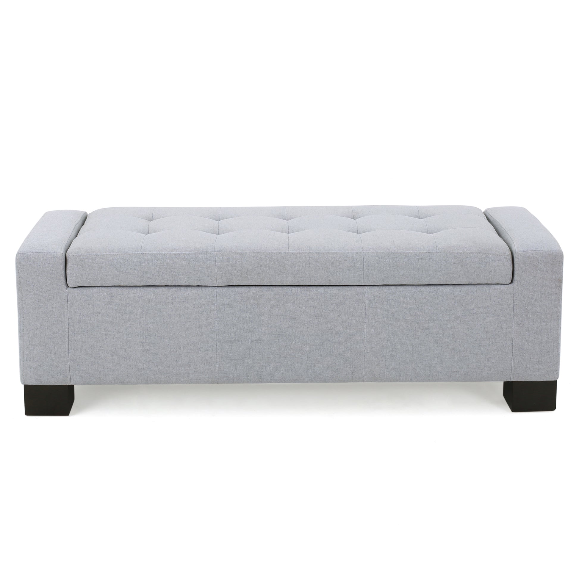 Light grey fabric storage ottoman with diamond tufting on lid