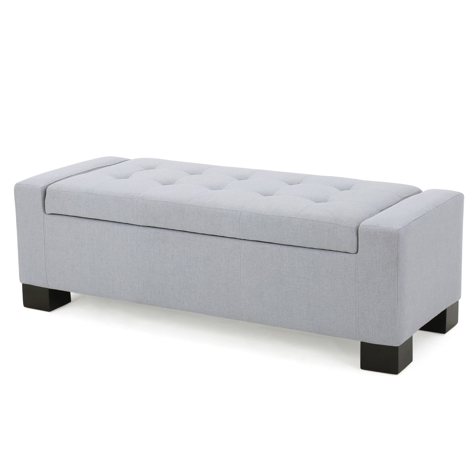 Grey fabric storage bench with tufted lid and dark wooden legs