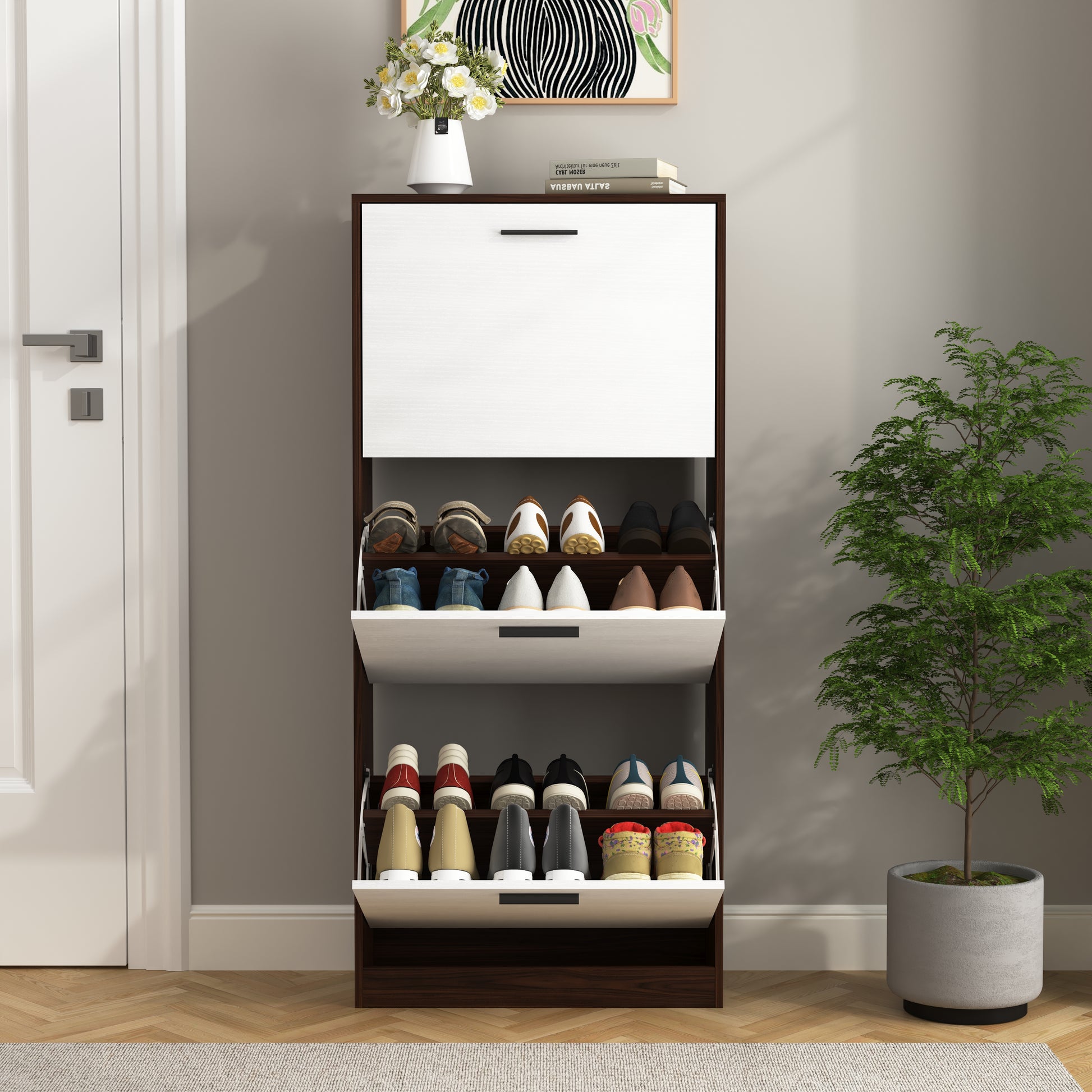 Dark wood and white flipdrawer shoe cabinet with multiple pairs of shoes
