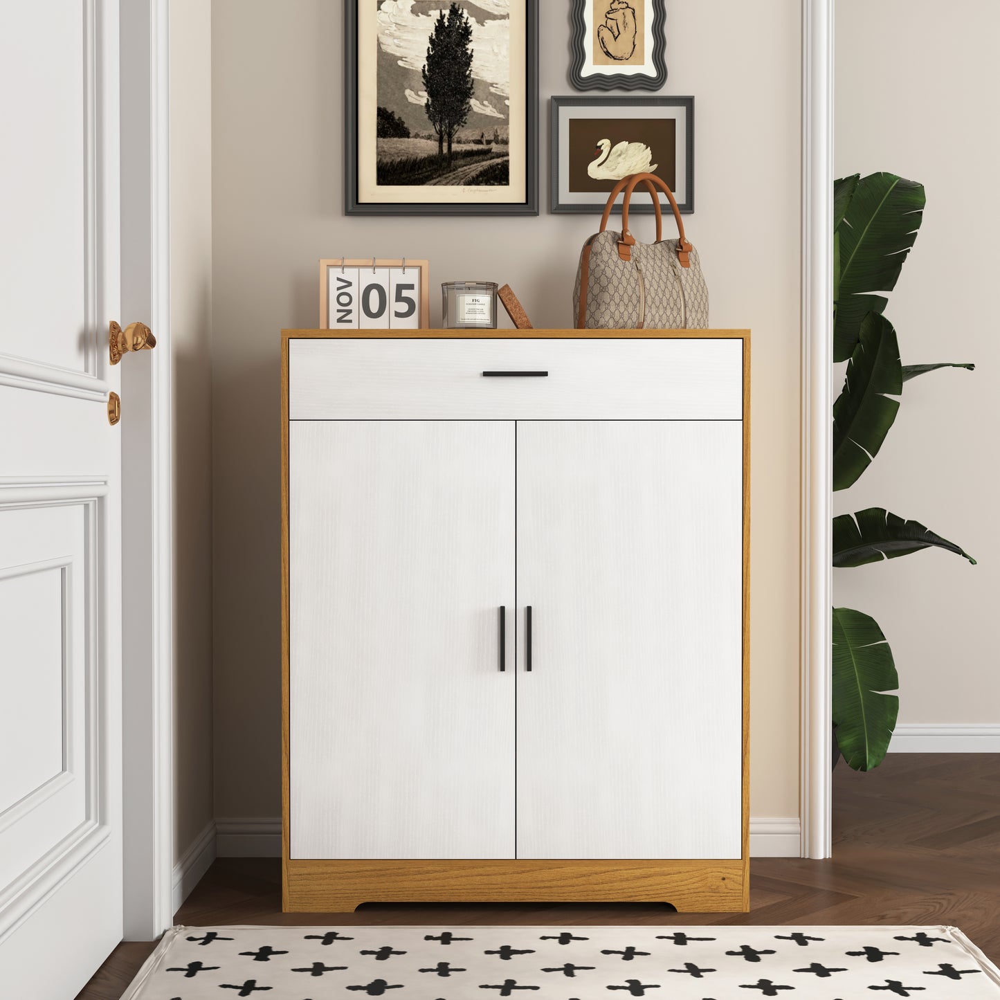 White and wood entryway cabinet with two doors and a drawer