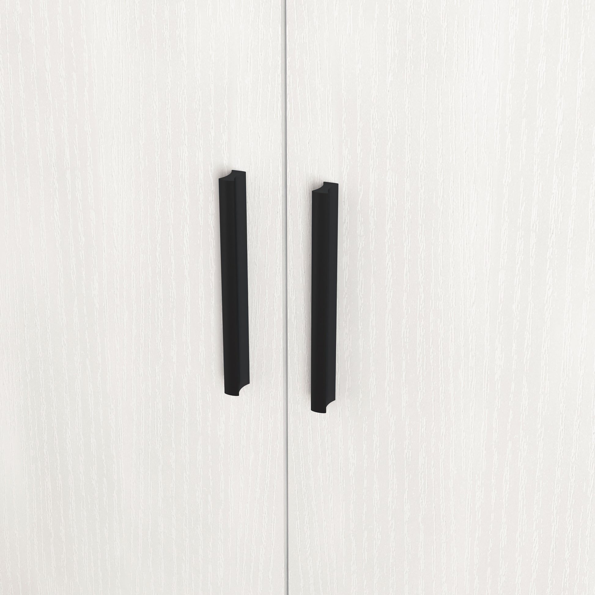 Black modern cabinet handles on white wood grain door