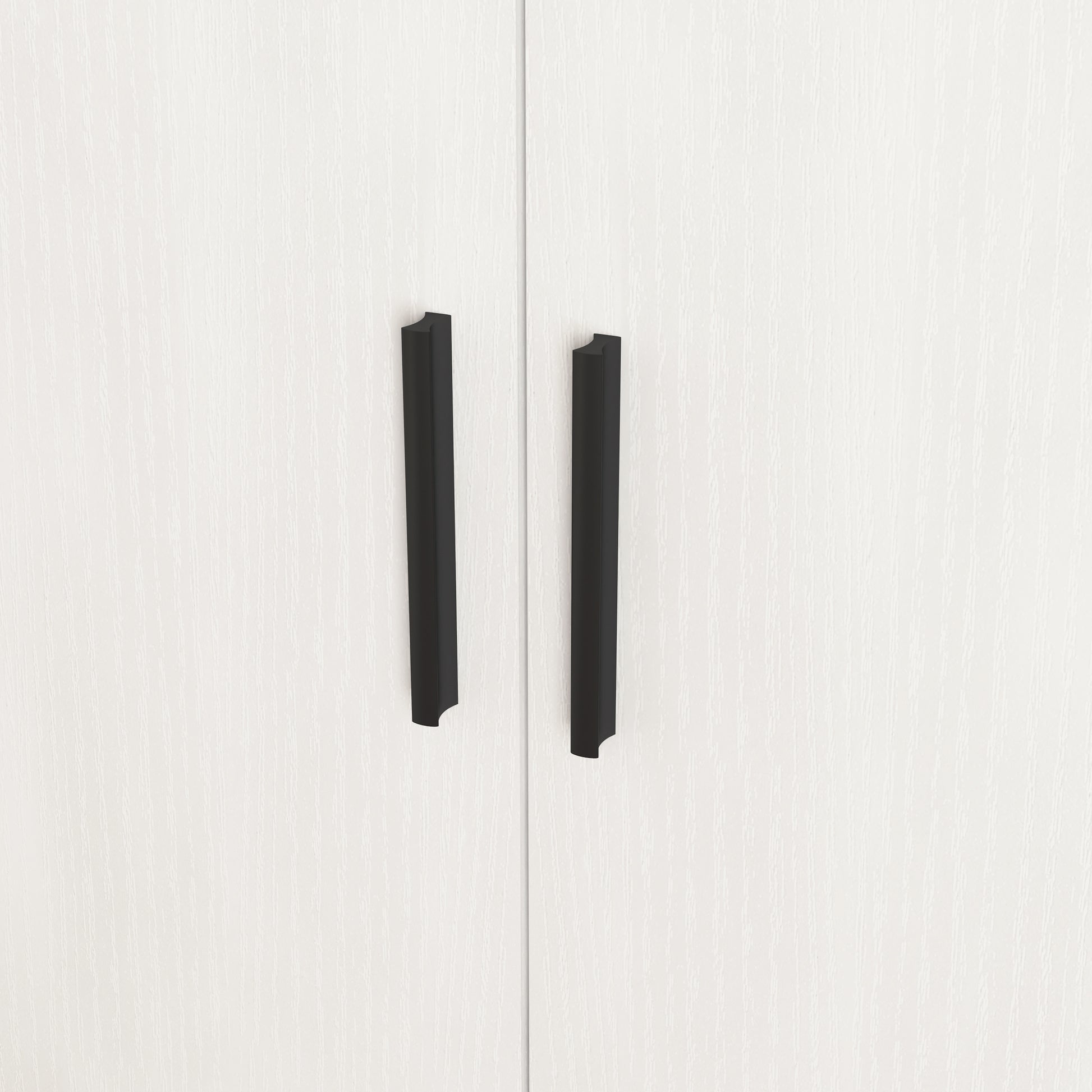 Modern black cabinet handles on white textured doors