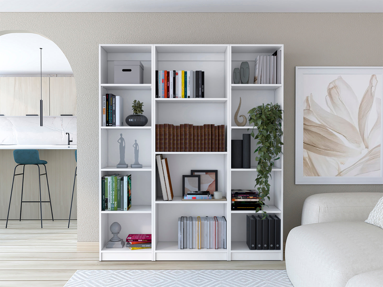 White modern modular bookshelf filled with books and decor