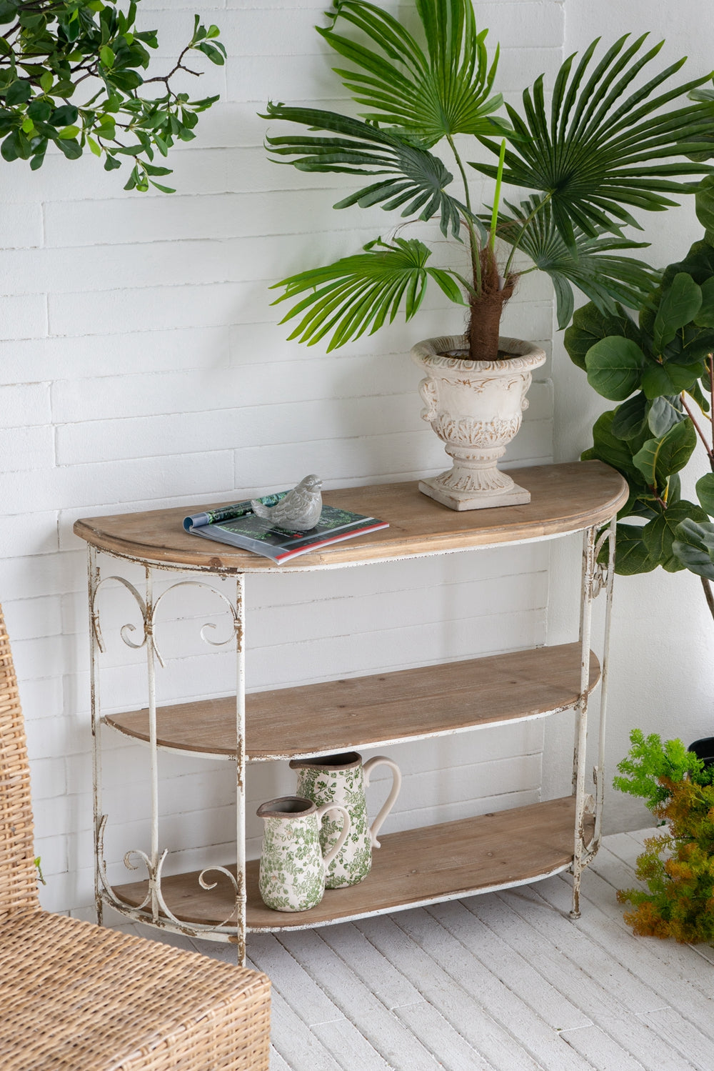 Rustic wooden console table with wrought iron accents and three shelves