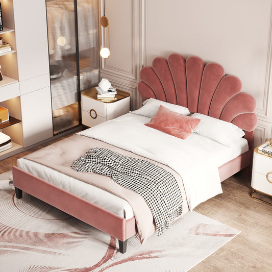 Pink velvet bed with a unique scallop headboard