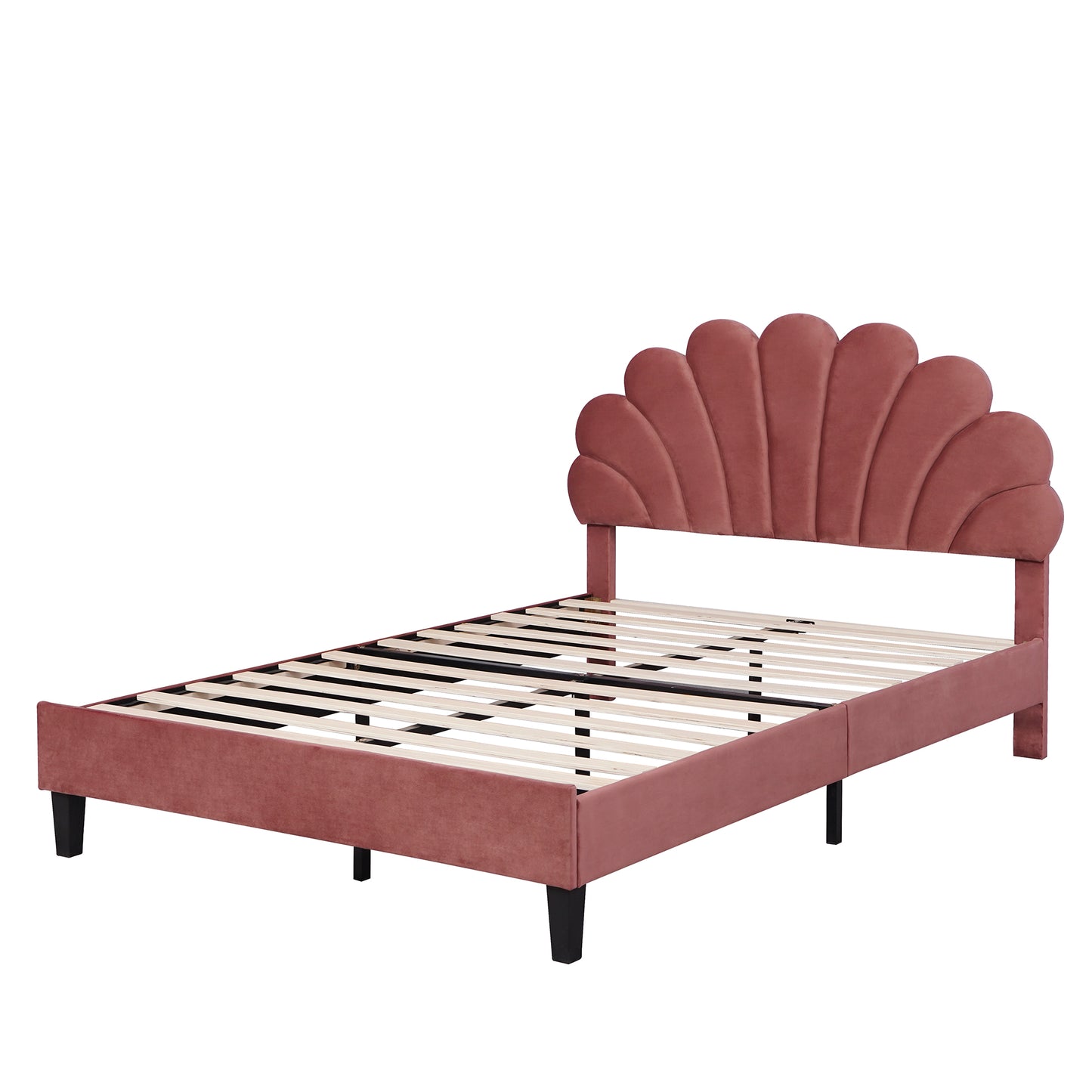 Pink velvet platform bed with scalloped headboard