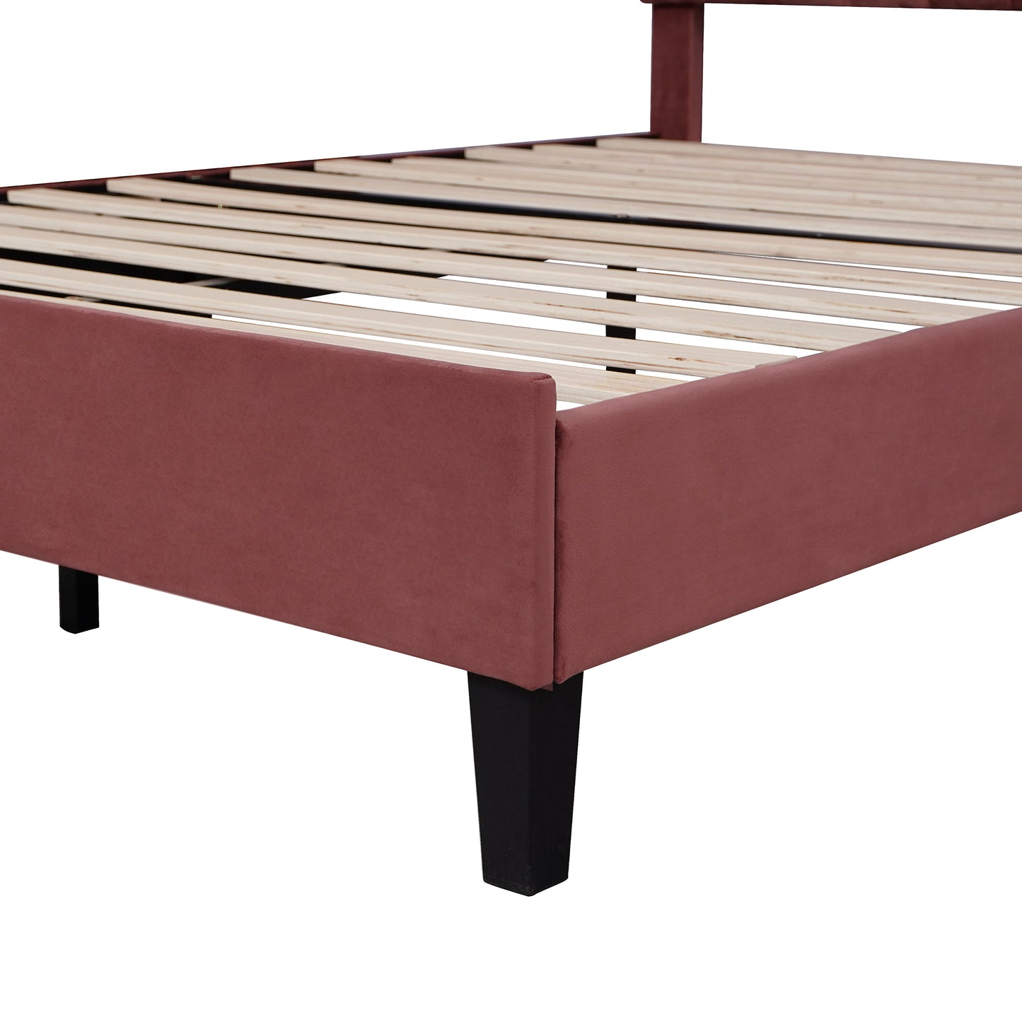Rose velvet upholstered bed frame with wooden slats and black legs