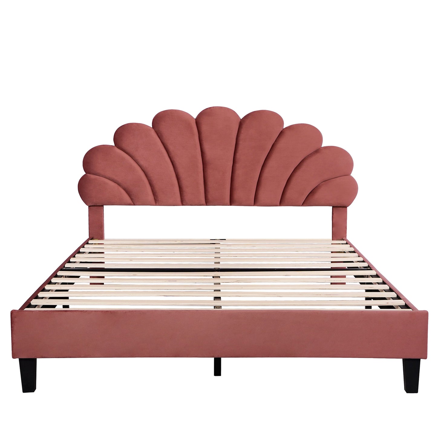 Pink velvet bed frame with unique shellshaped headboard and wooden slats