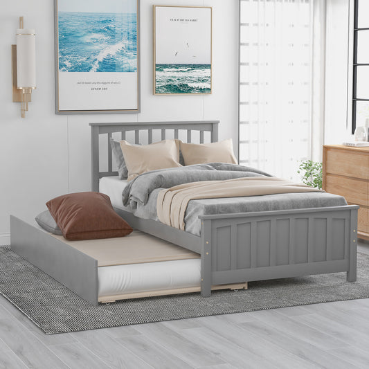 Grey wooden daybed with pullout trundle and upholstered cushions perfect for guest rooms