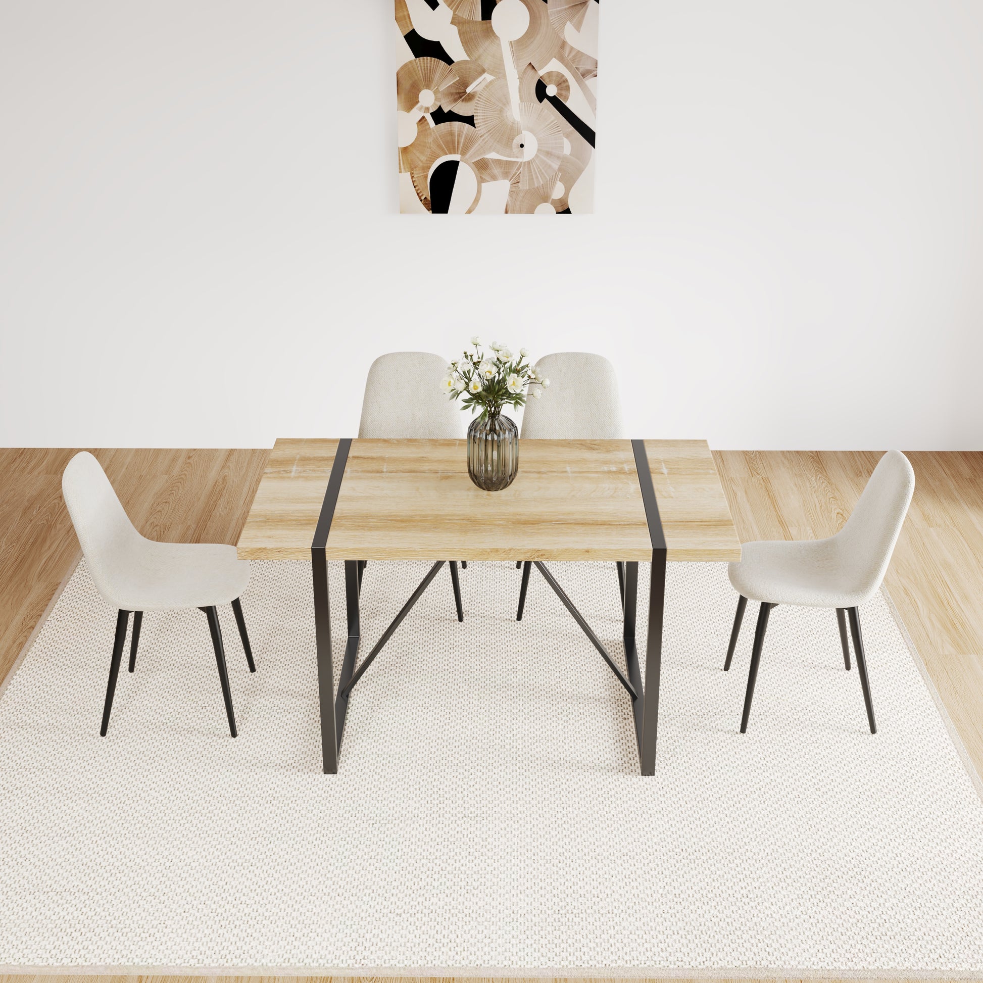 Light oak dining table with black metal legs and beige upholstered chairs