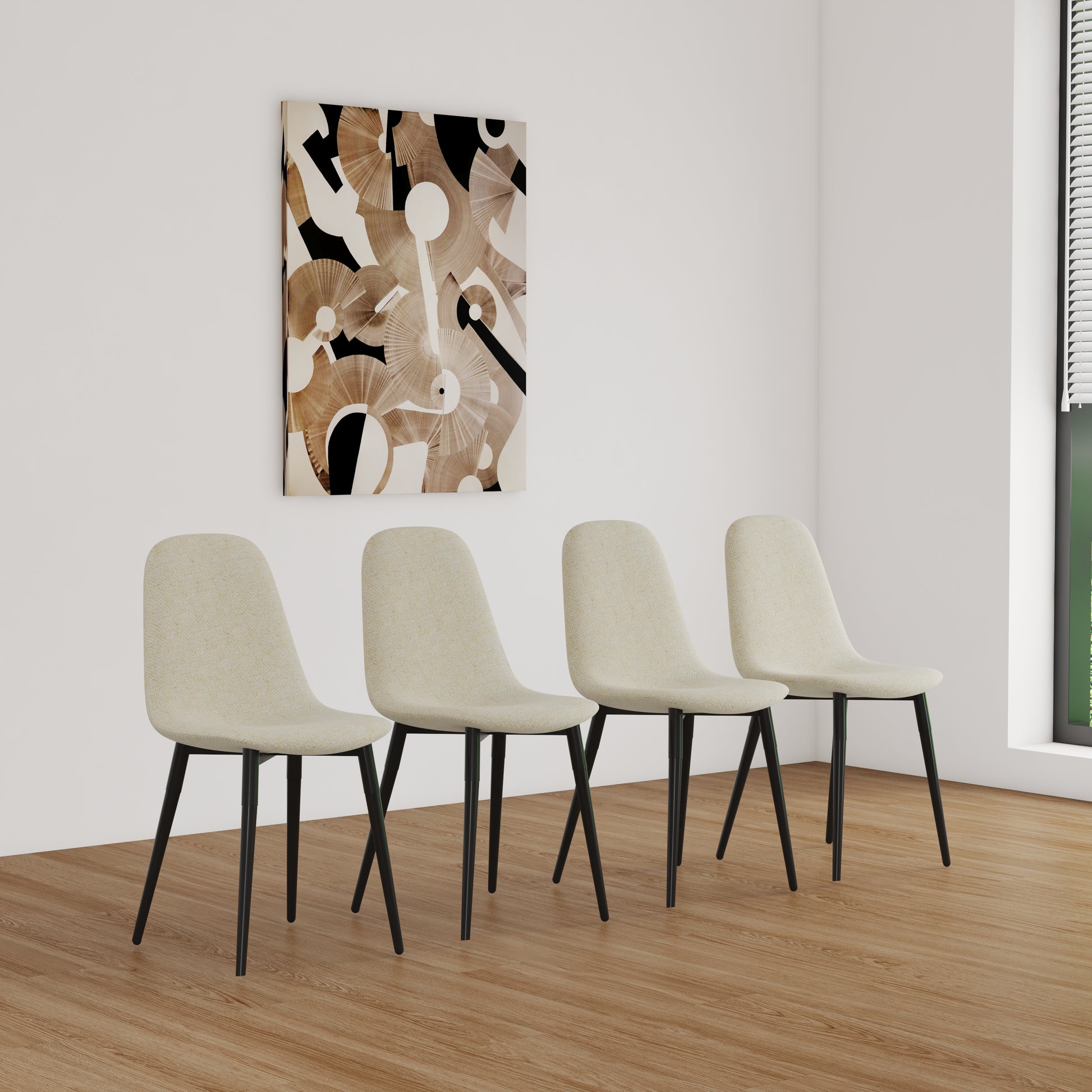 Four light beige fabric upholstered dining chairs with black metal legs