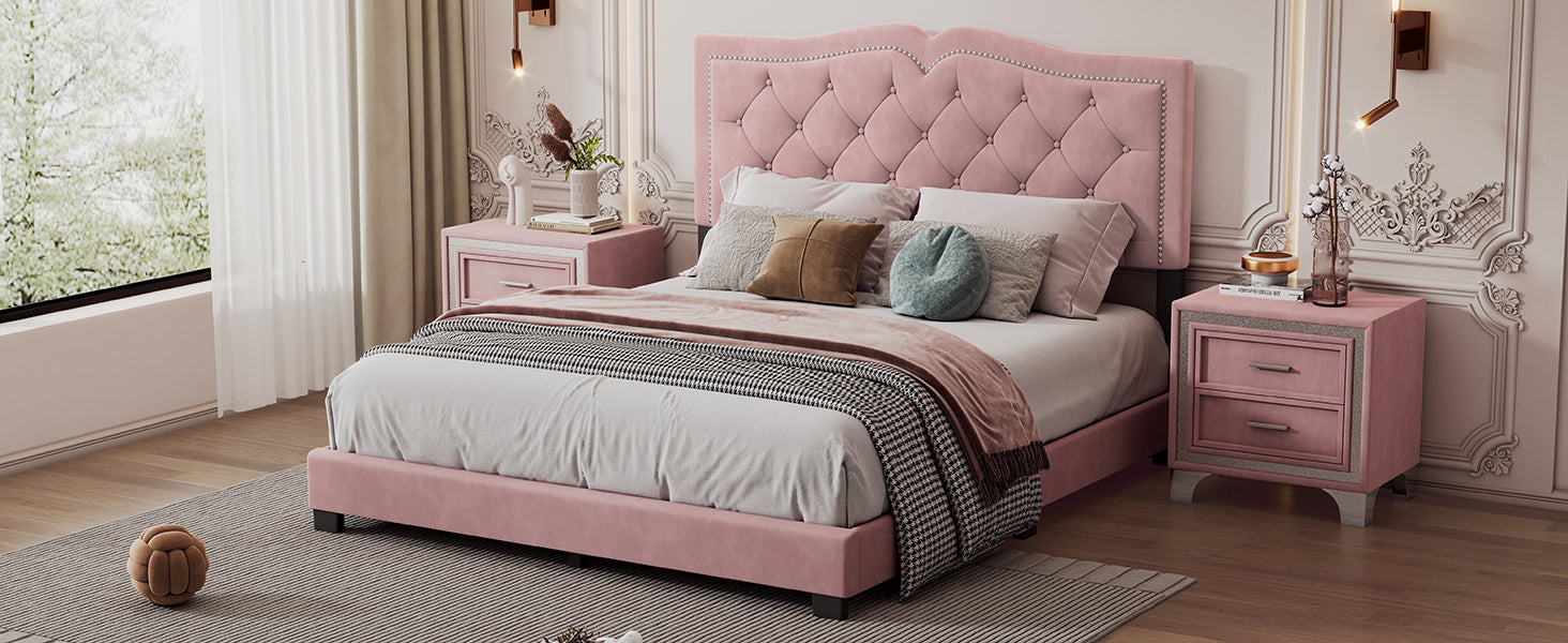 Pink velvet tufted bed frame with crystal accents and plush pillows