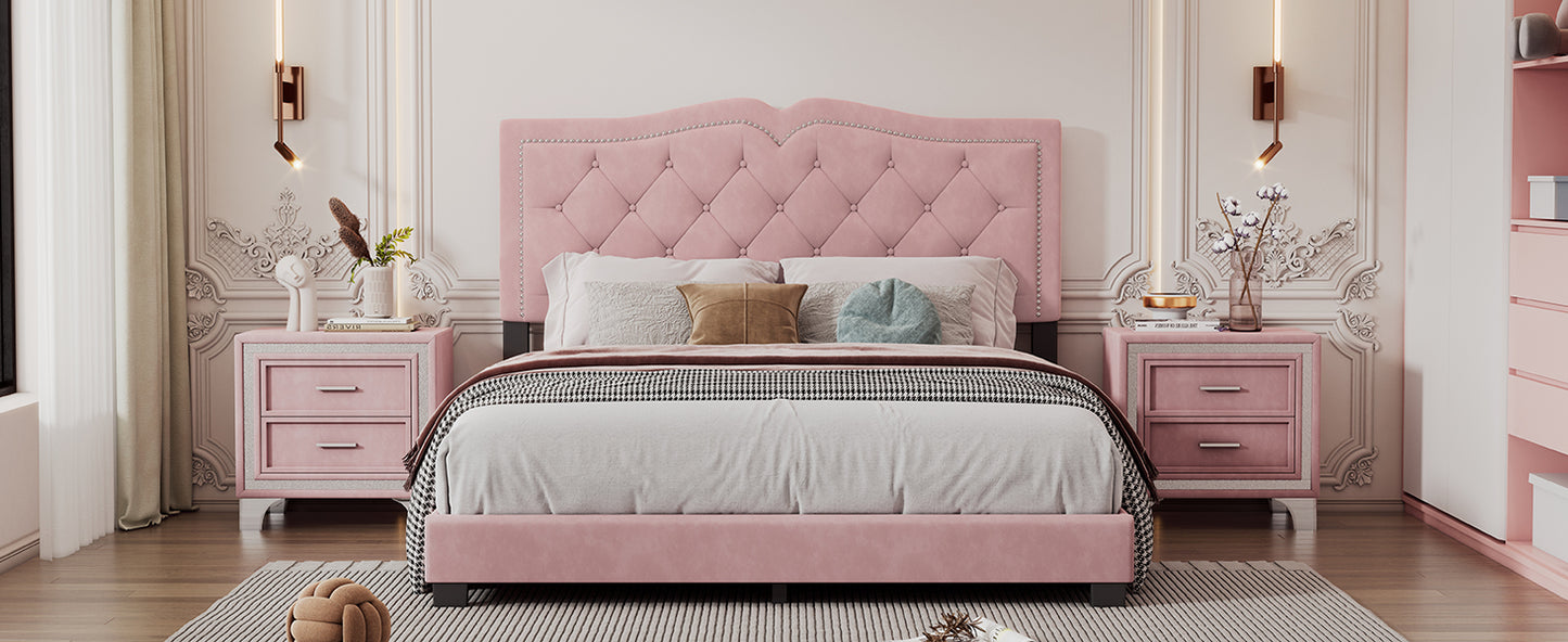 Pink tufted velvet bed with silver nailhead trim and diamond tufting