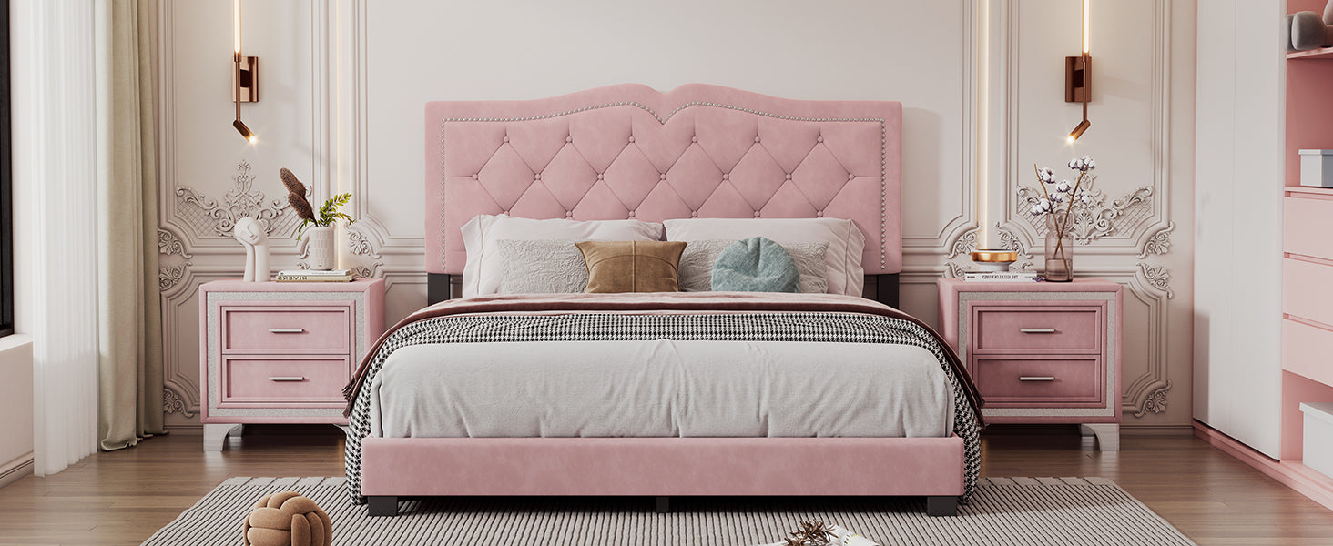Pink tufted velvet bed with silver nailhead trim and diamond tufting