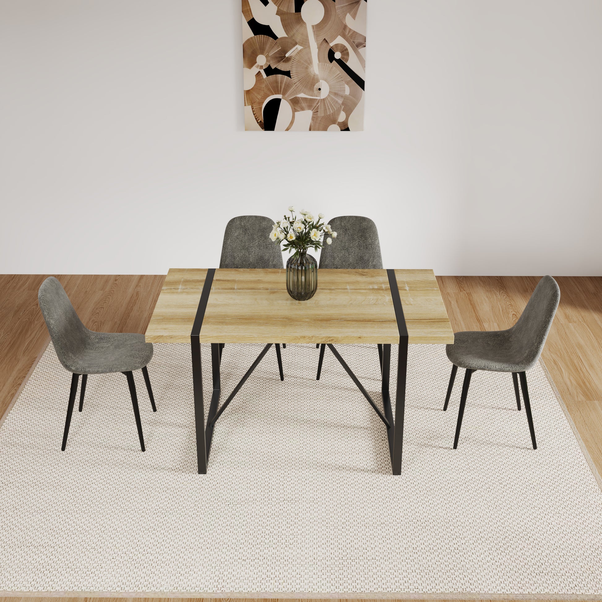 Modern dining table with oak top and black metal legs seats four