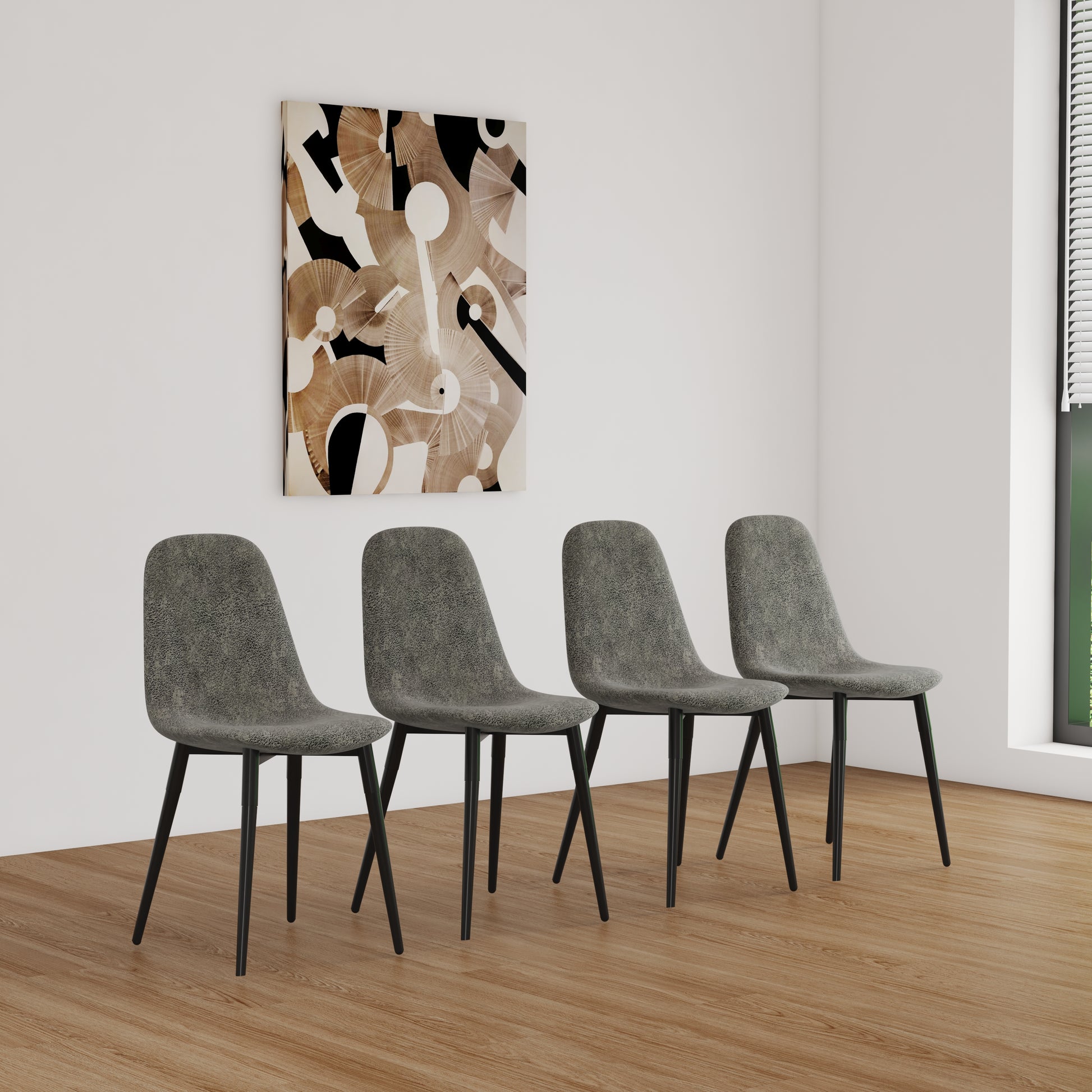 Four grey fabric dining chairs with black metal legs