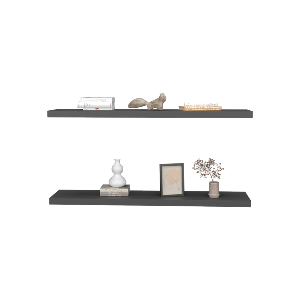 Dark grey floating shelf with books and abstract sculpture