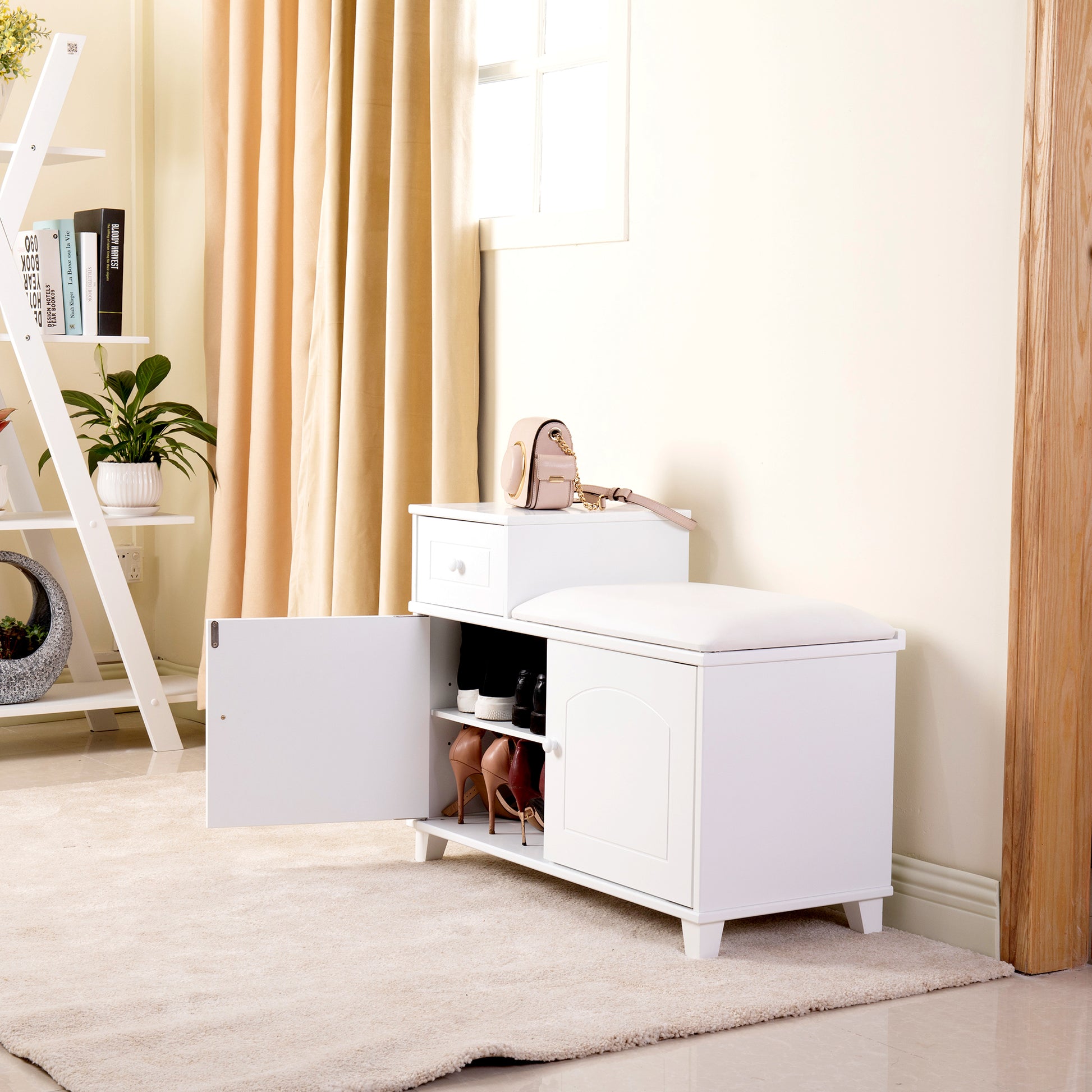White wooden shoe bench with storage drawer and cushioned seat