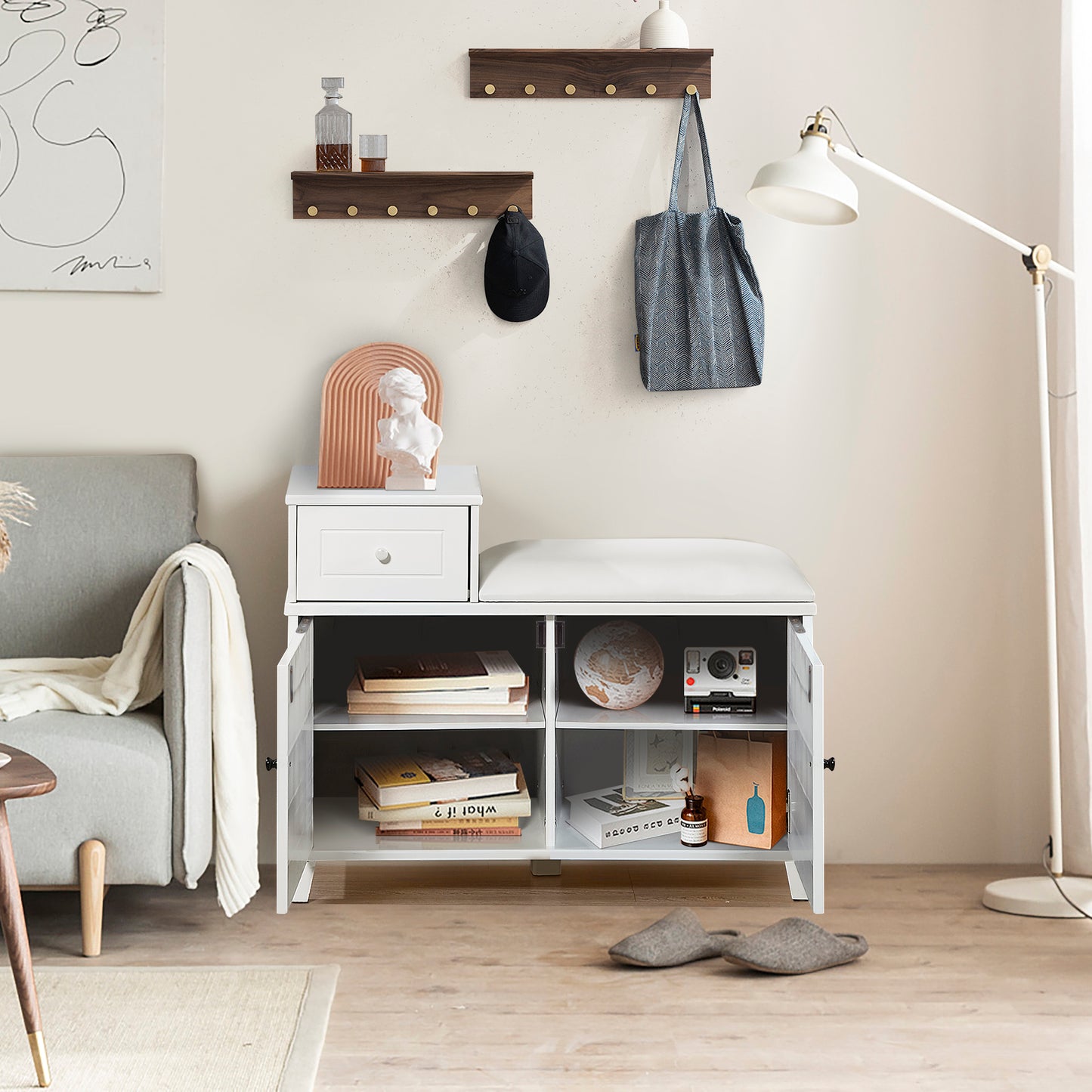 White shoe cabinet with cushioned top and storage shelves