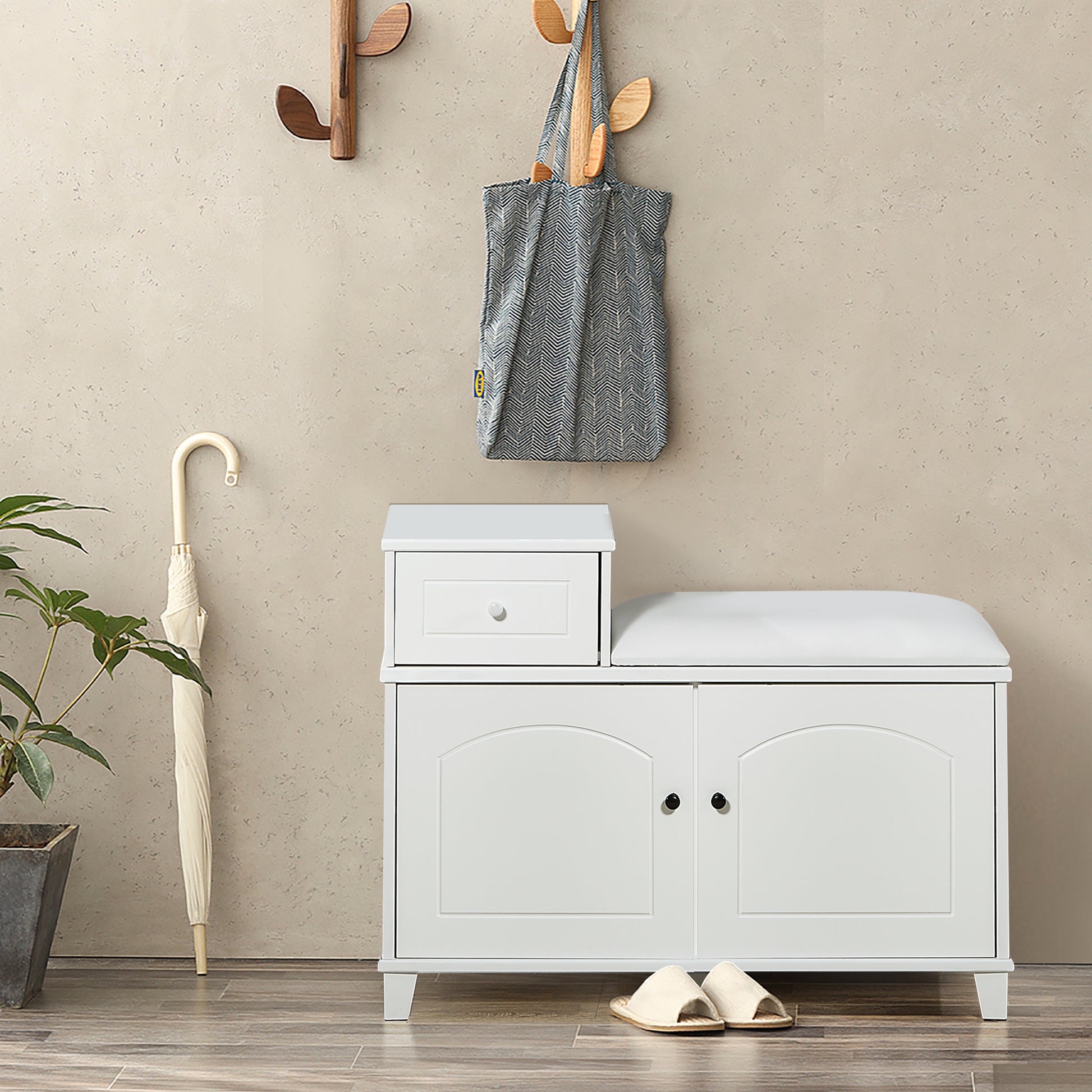White entryway bench with shoe storage and padded seat