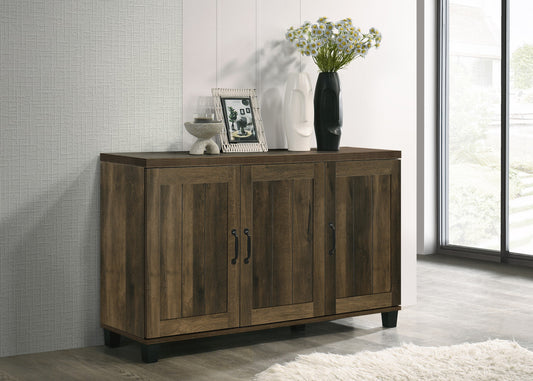 Rustic brown threedoor cabinet with dark wood finish and black handles