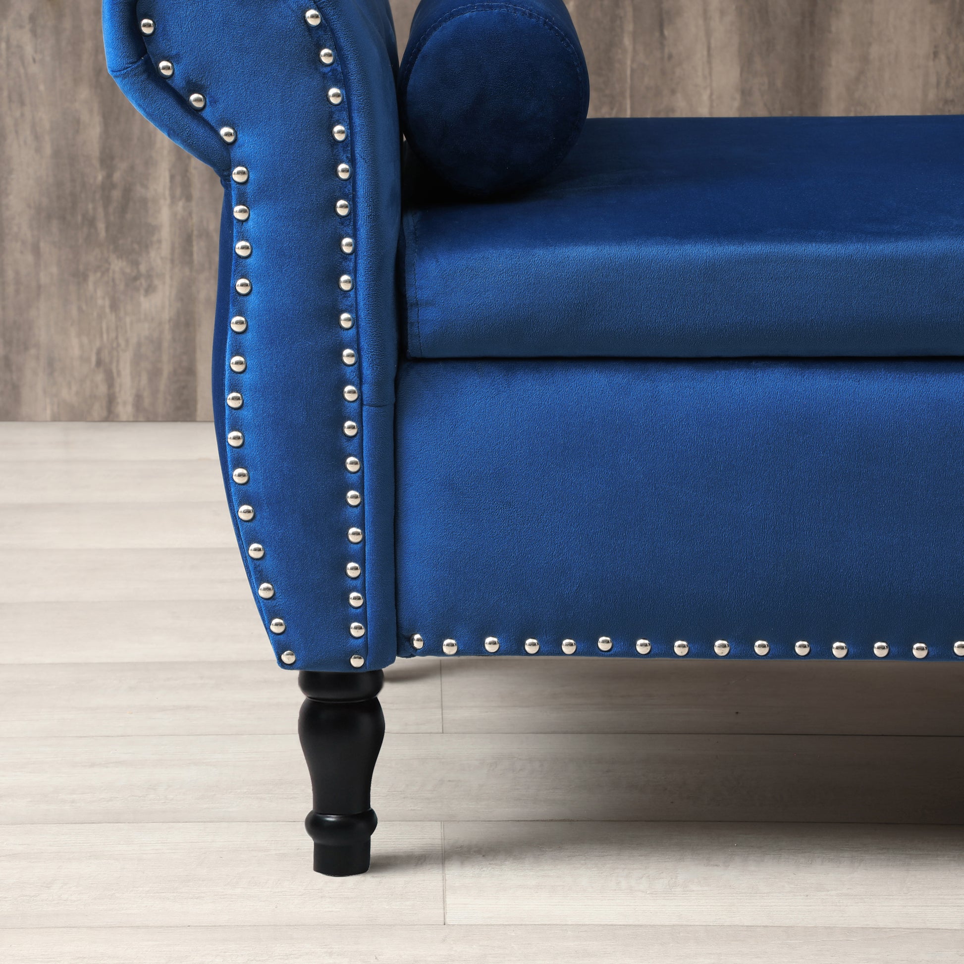 Royal blue velvet armchair with silver stud detailing