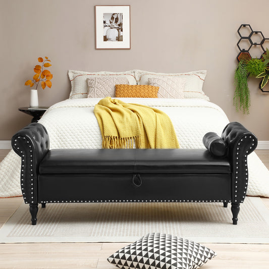 Black faux leather tufted storage bench with silver nailhead trim