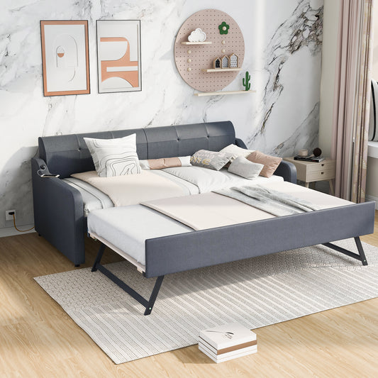 Dark grey fabric sofa bed with pullout mattress