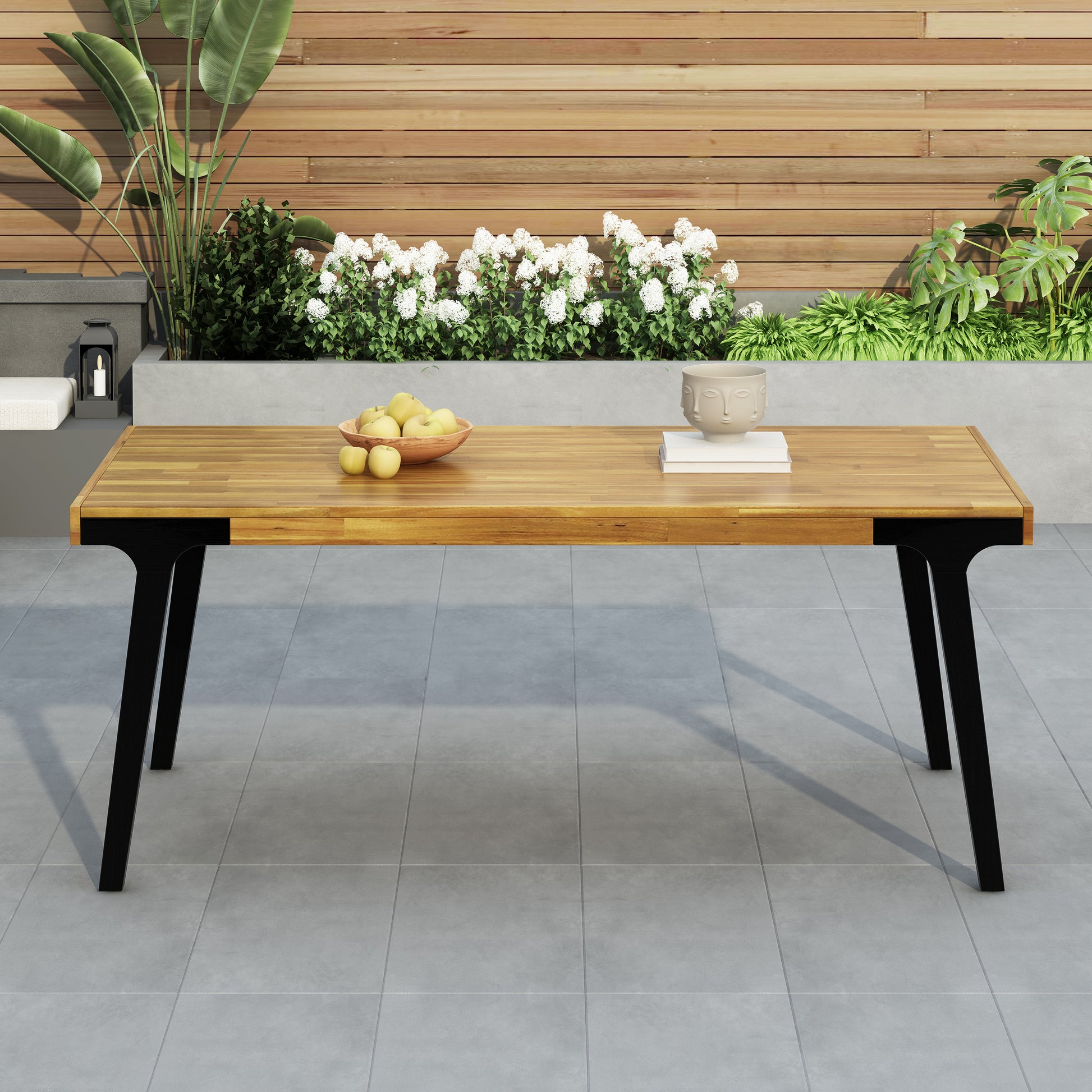 Modern acacia wood outdoor dining table with black tapered legs