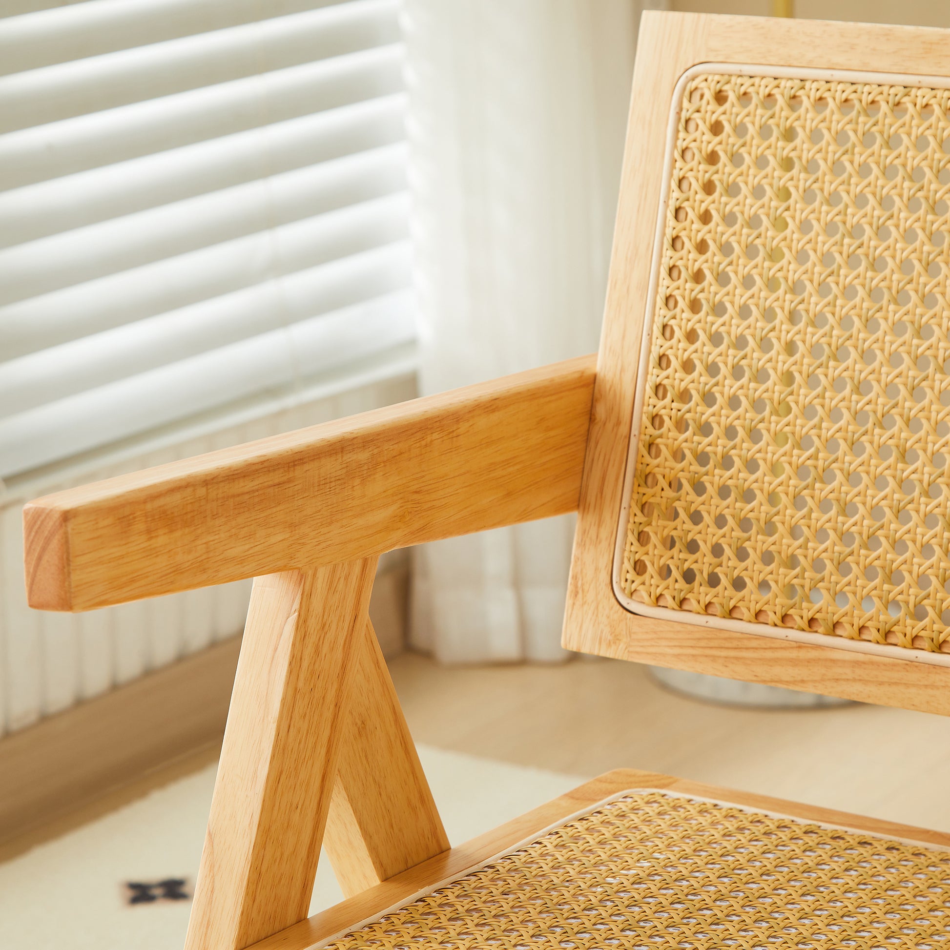 Natural wood accent chair with intricate rattan weave back