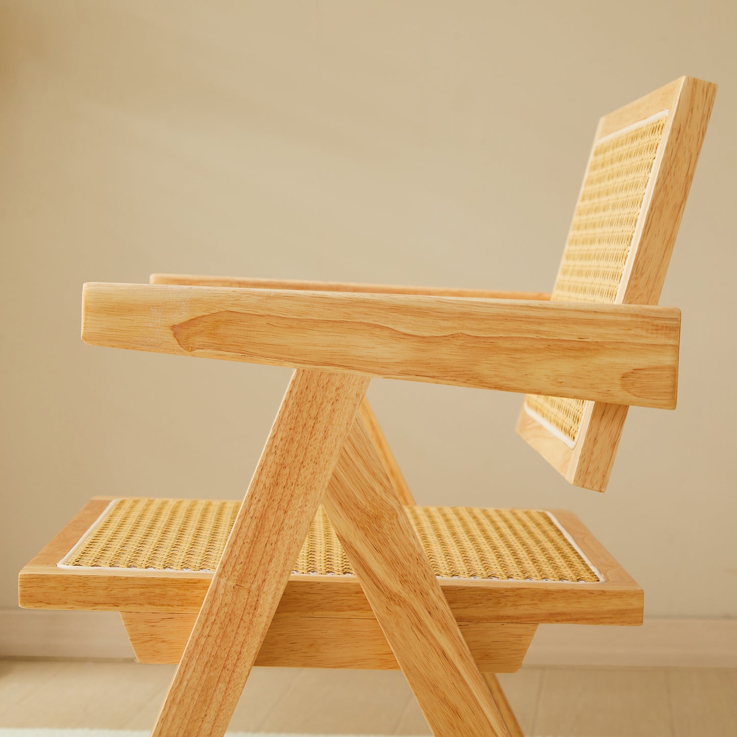 Modern light wood armchair with woven rattan seat and back