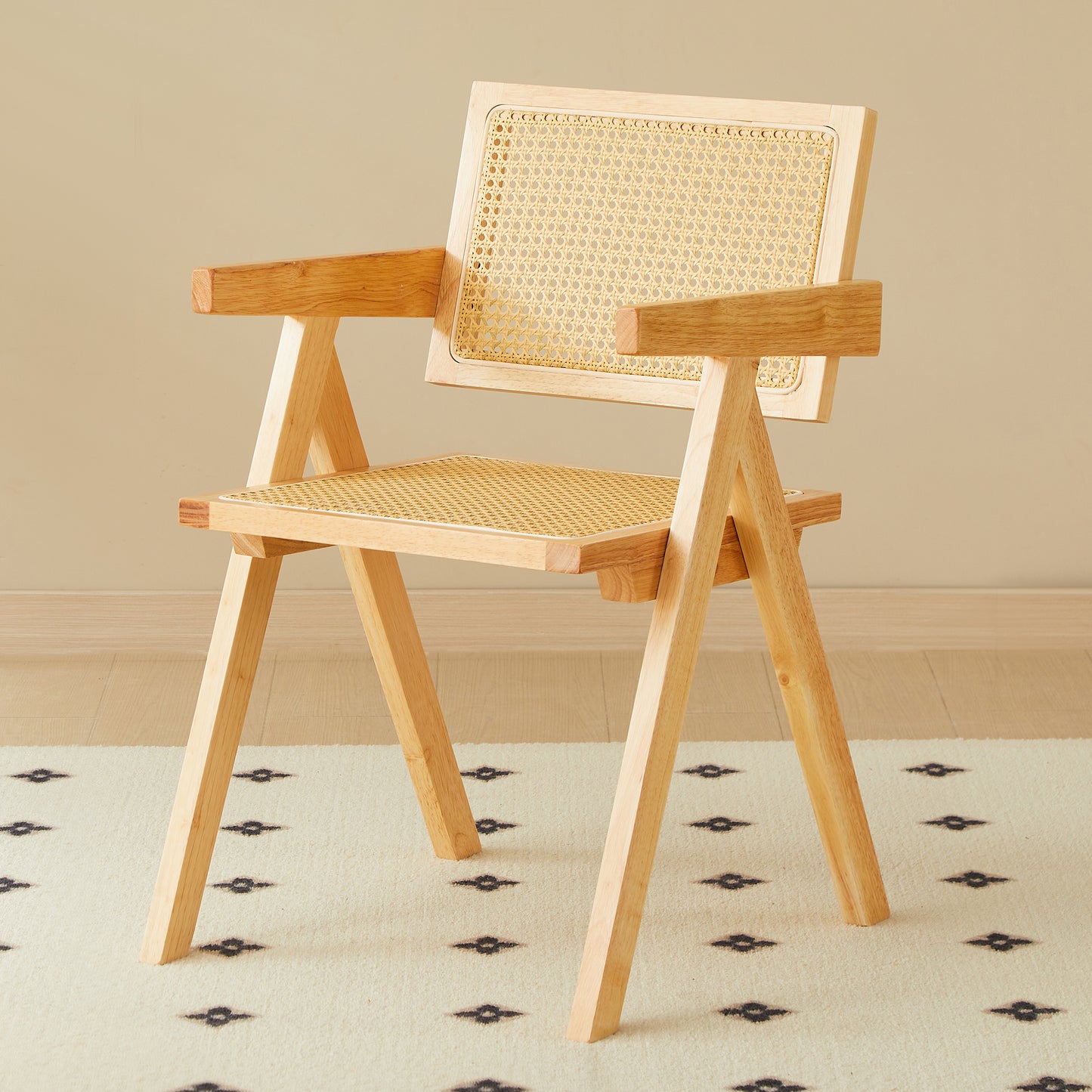 Natural wood armchair with cane seat and back