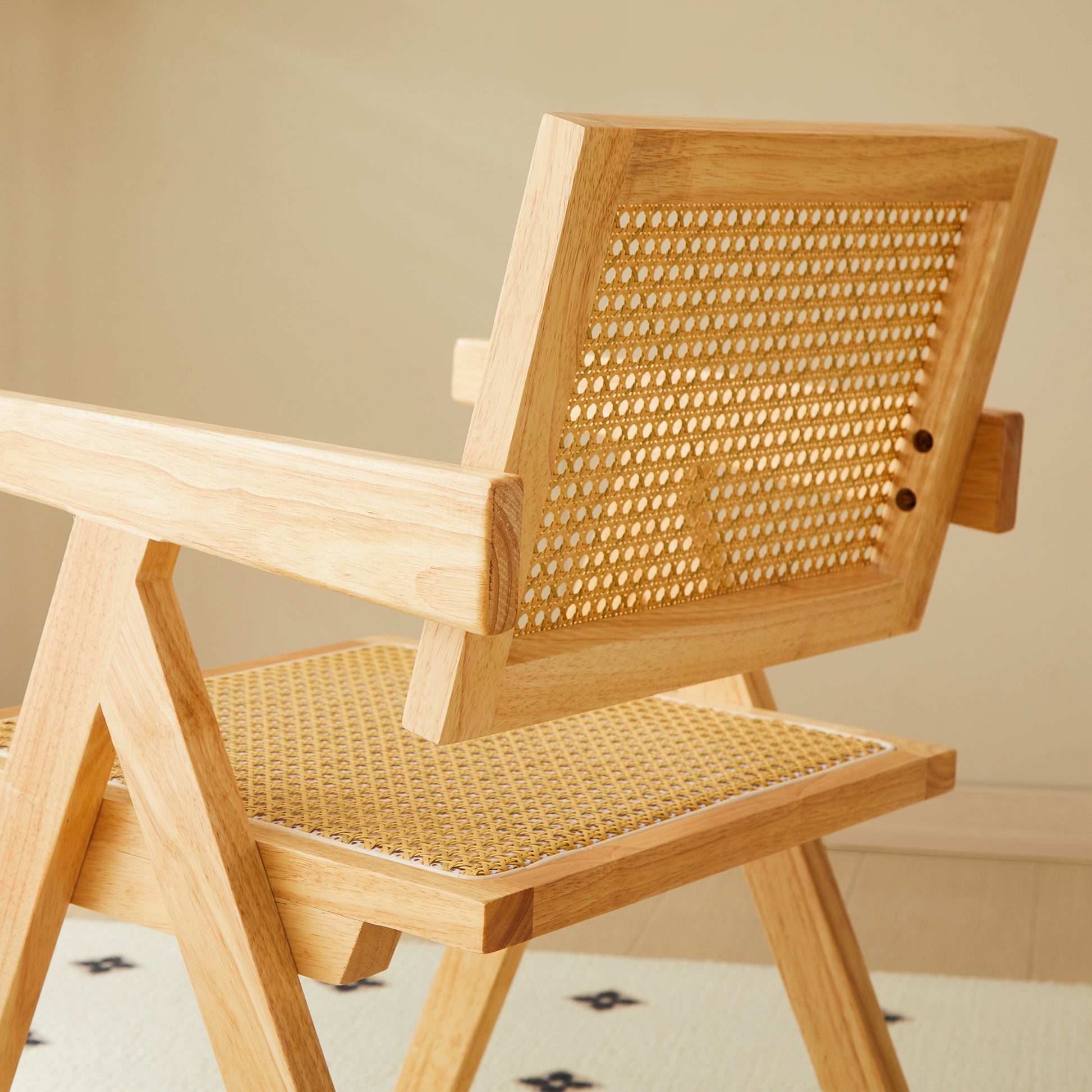 Natural wood chair with cane back and seat