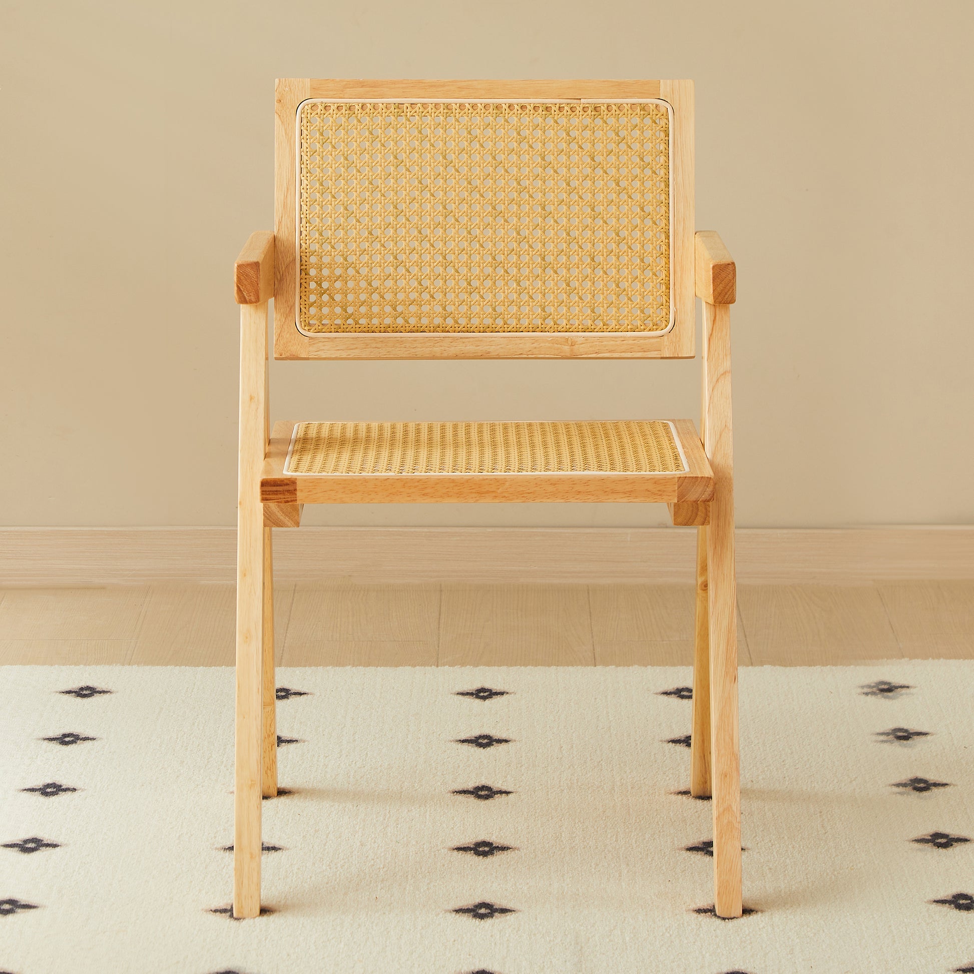 Natural wood armchair with woven cane seat and back