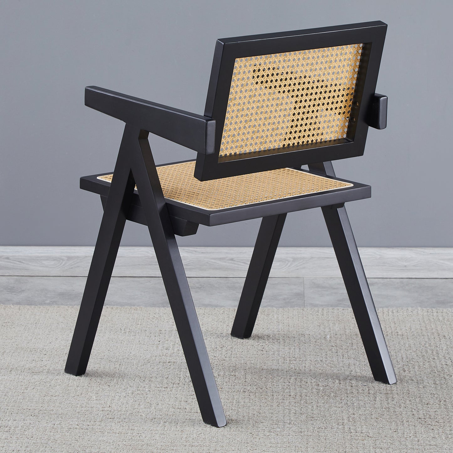 Black frame cane dining chair with natural cane seat and back