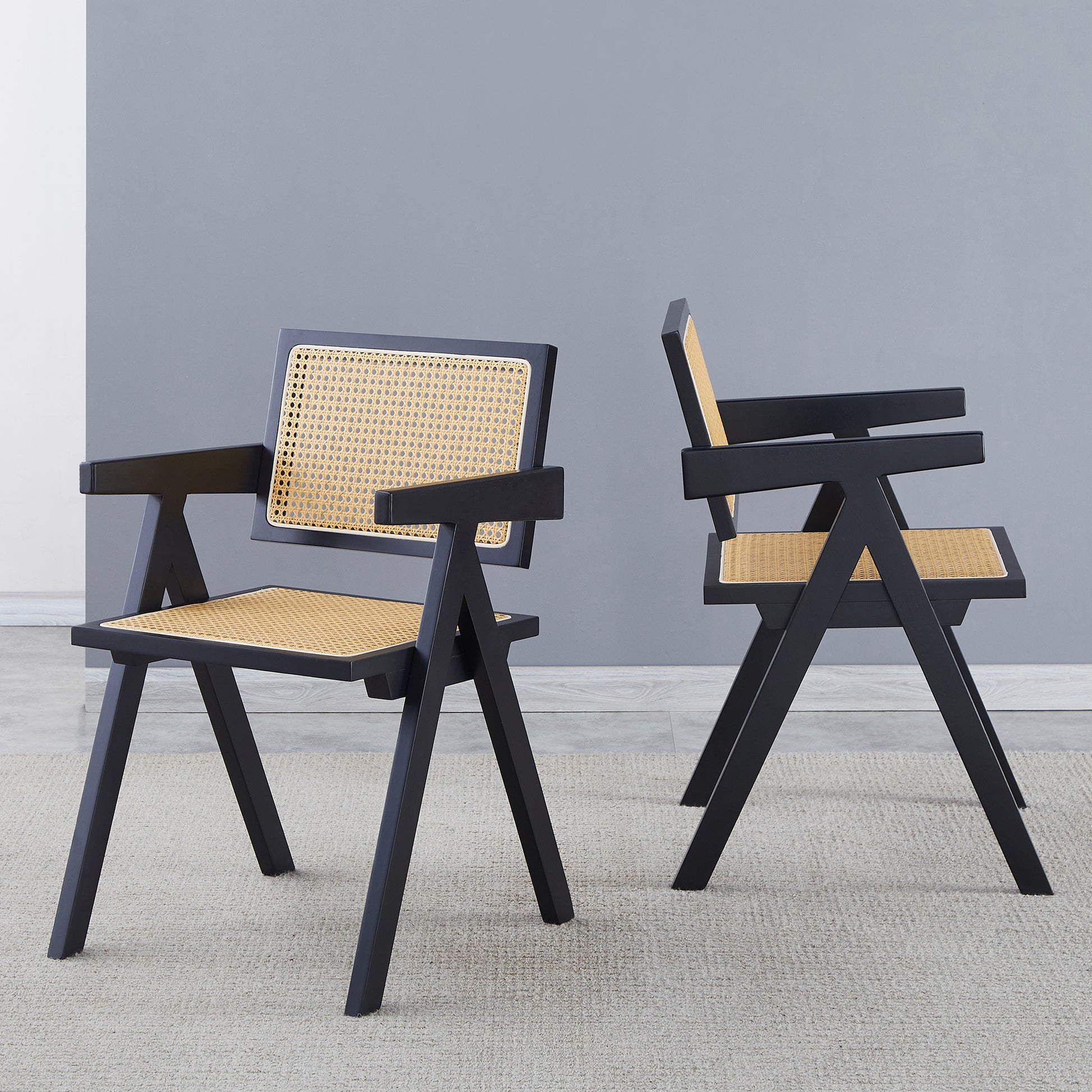 Black cane accent chair with wooden frame