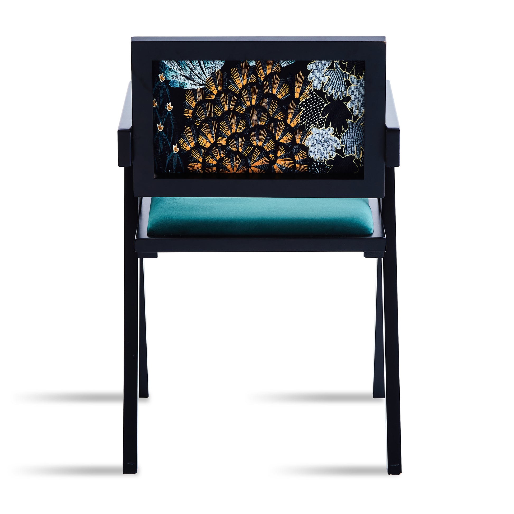 Black armchair with ornate floral embroidery on backrest and teal seat cushion