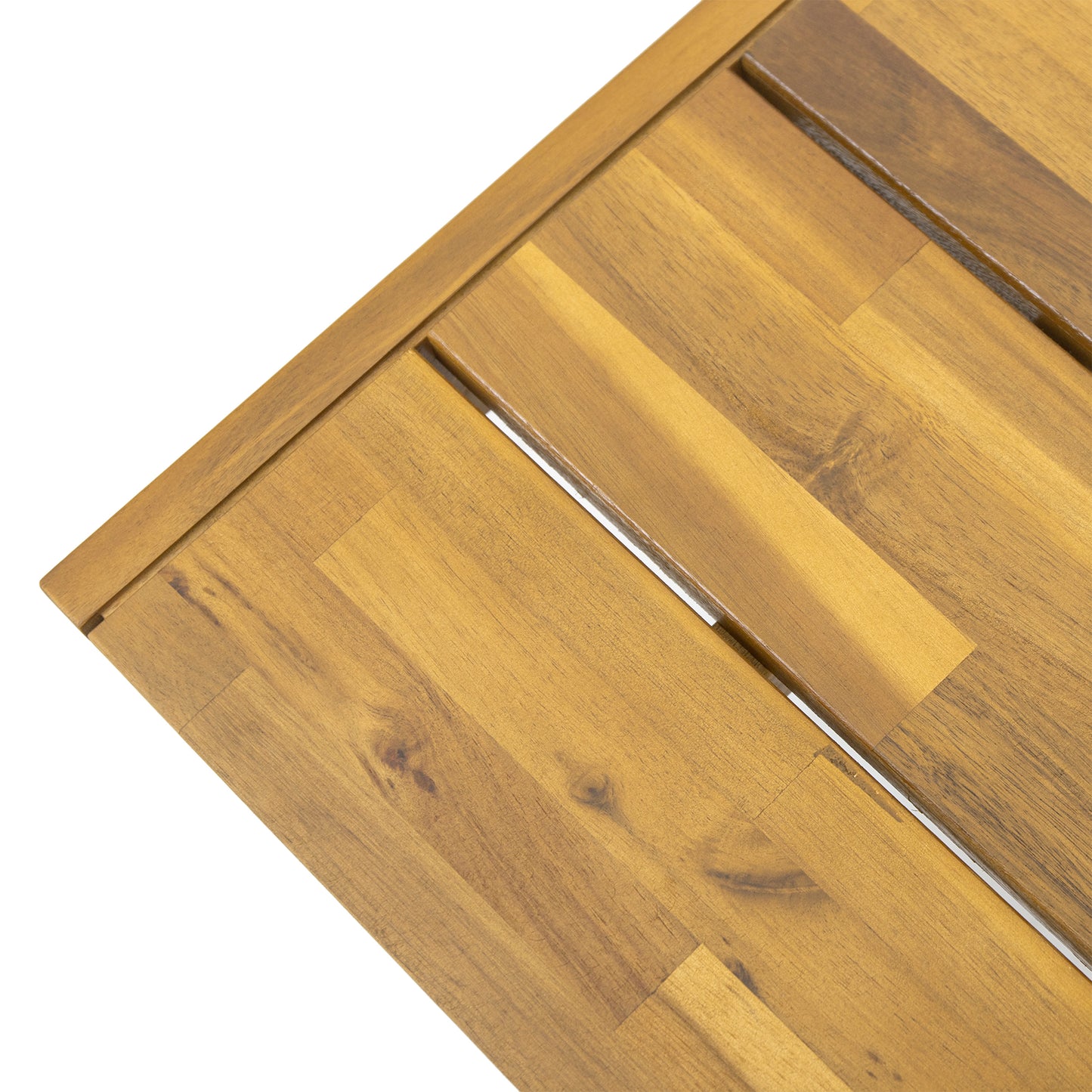 Closeup of golden teak wood grain on slatted table surface