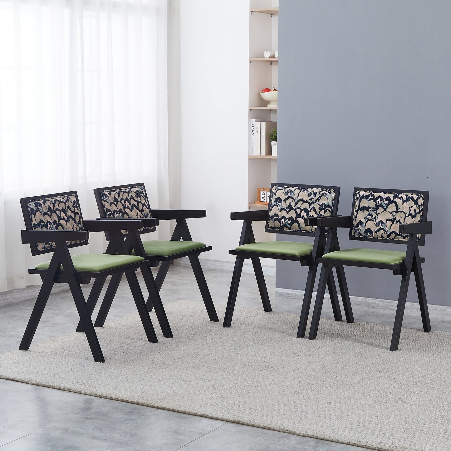 Black wood accent chair with green seat and patterned backrest