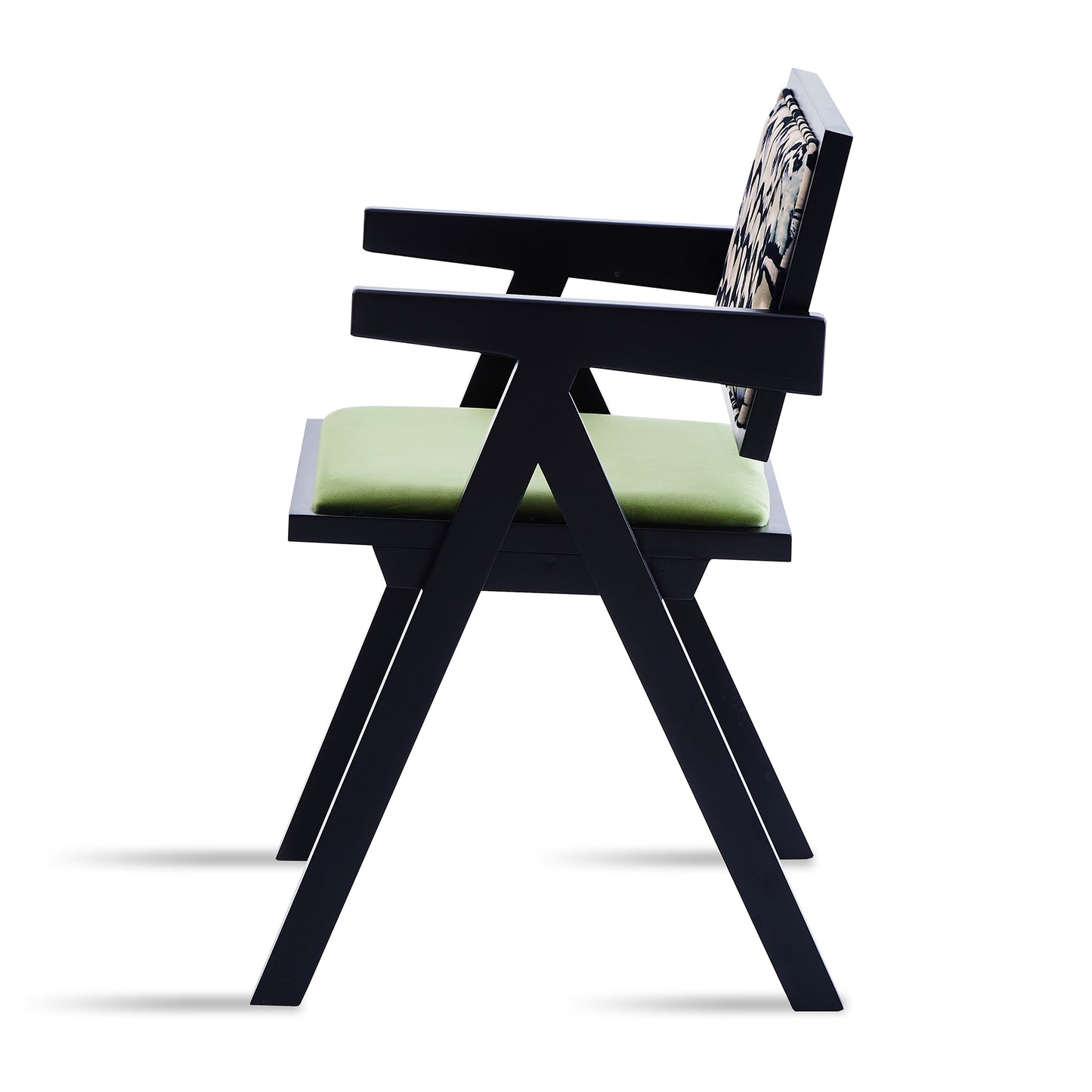 Modern black armchair with light green seat cushion and abstract patterned back