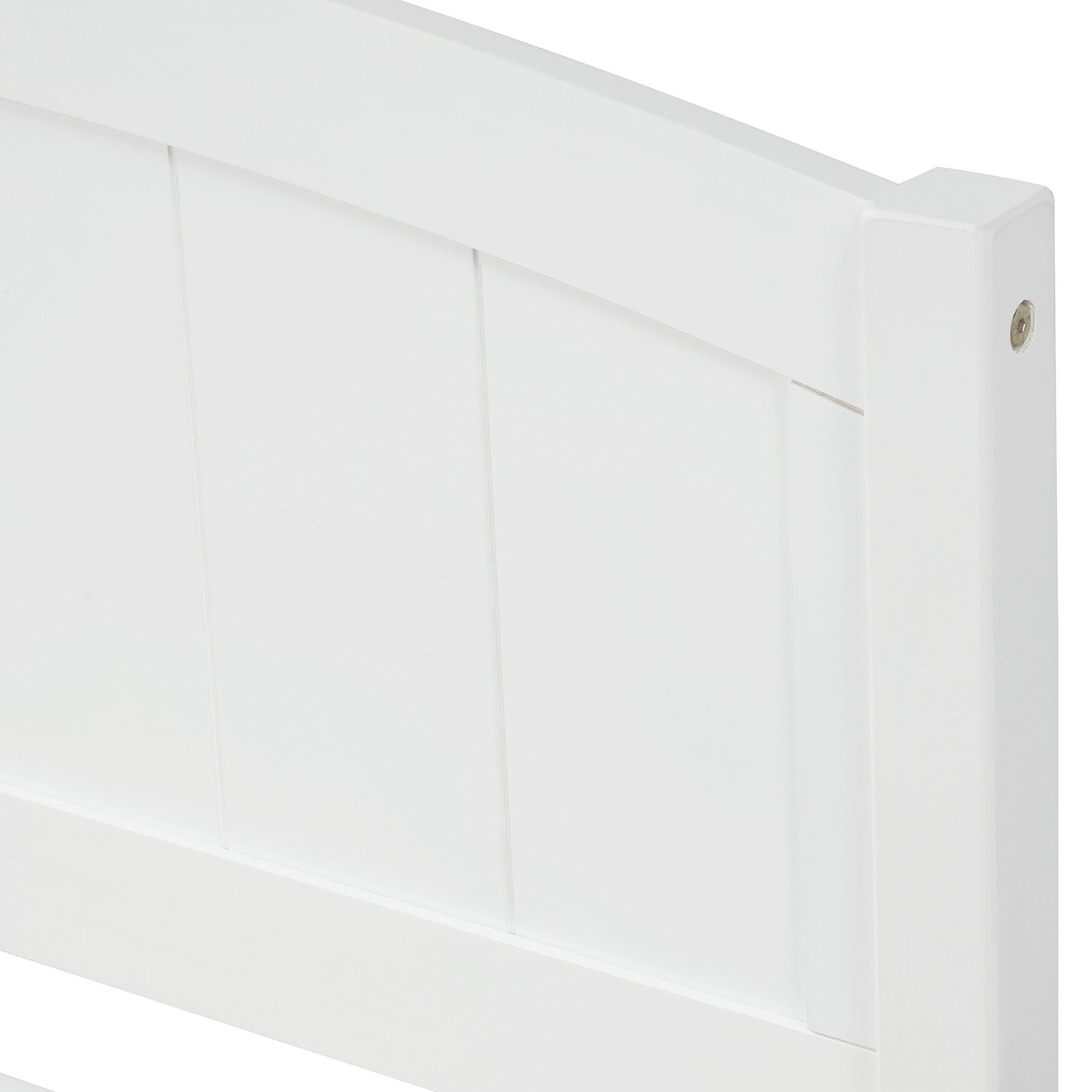 Close up of white wooden headboard with vertical paneling