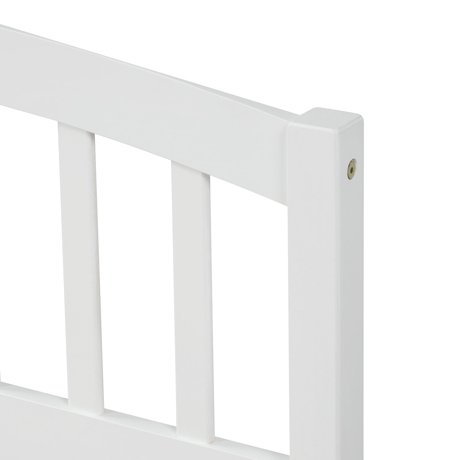 White wooden toddler bed railing with slatted design
