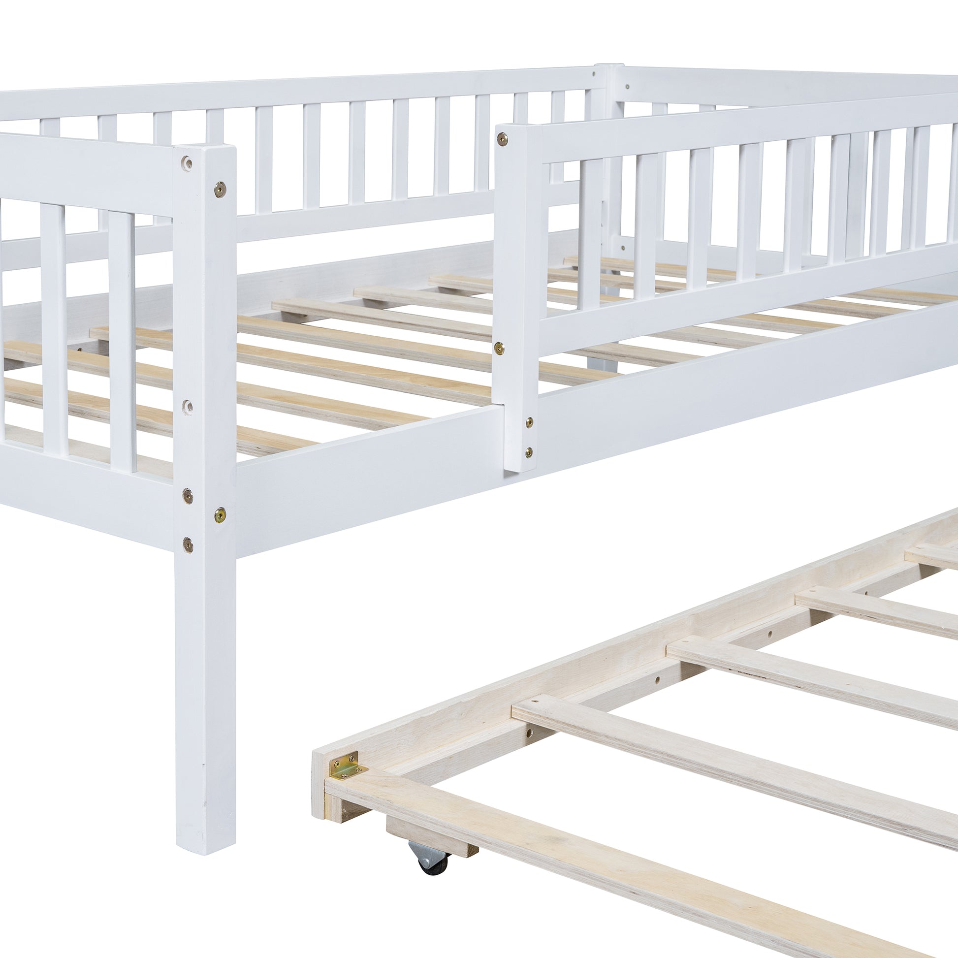 White wooden toddler bed frame with slatted mattress support and pullout trundle
