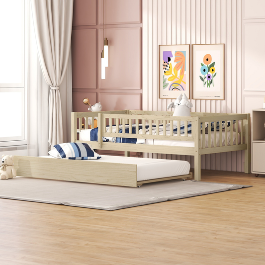 Light wood twin daybed with trundle featuring a slatted design and neutral bedding for a nursery