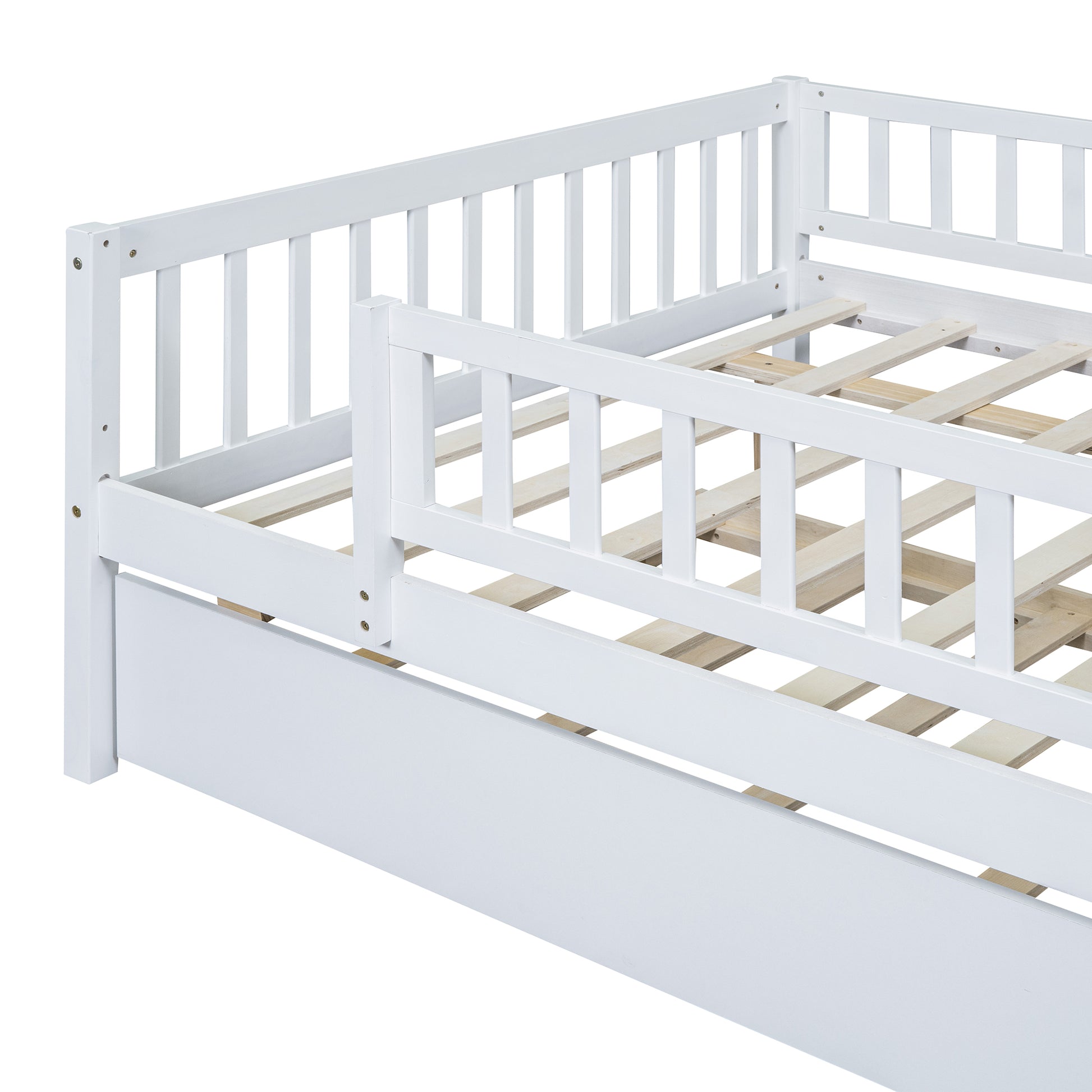 White wooden toddler bed frame with slatted side rails and base